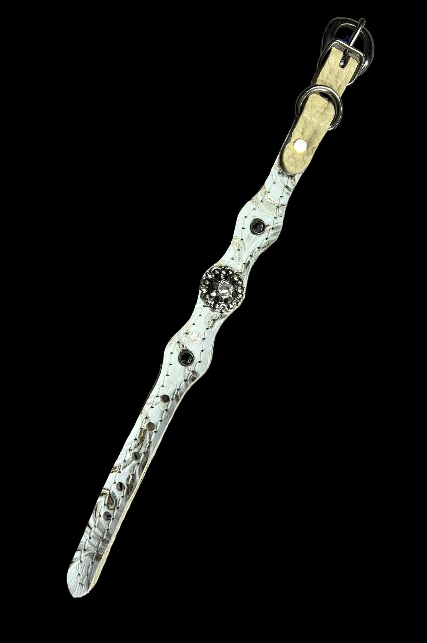 White and silver floral on dark leather