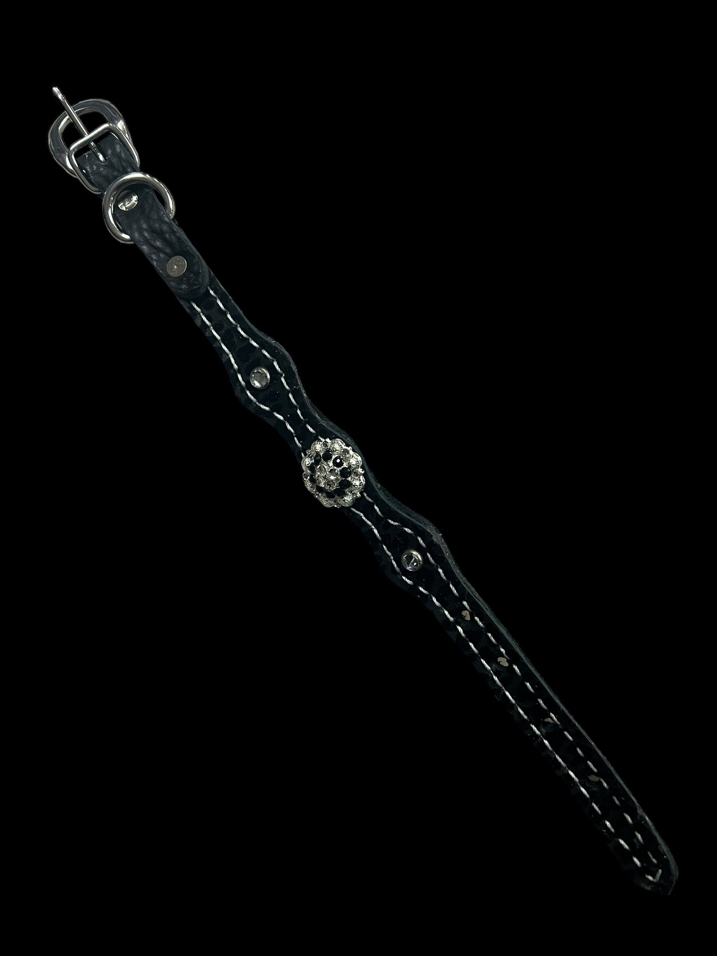 Black flocked leopard on dark leather