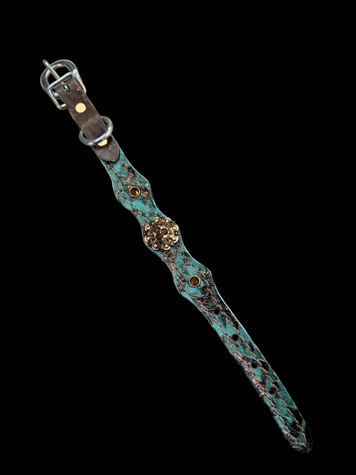 Teal and brown aztec on dark leather