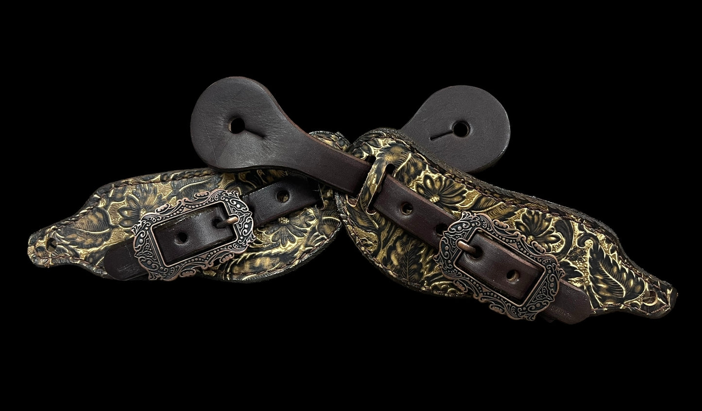 cream and brown daisy on dark leather