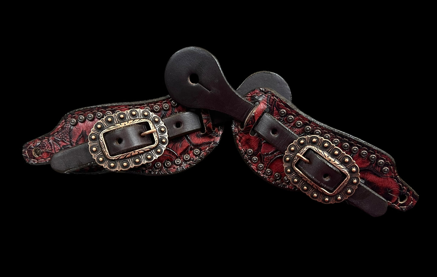 Red roses on dark leather