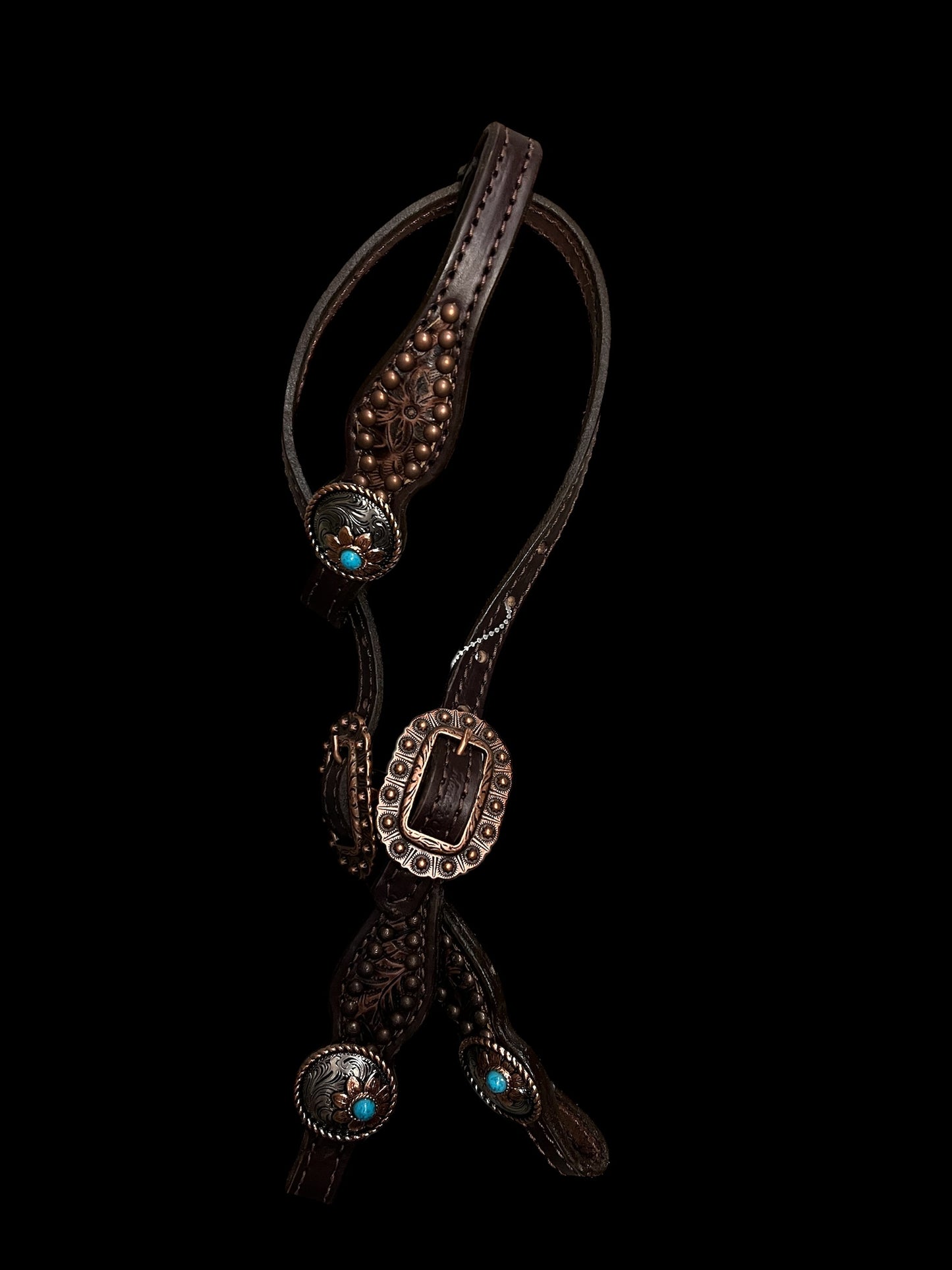 Brown floral on dark leather