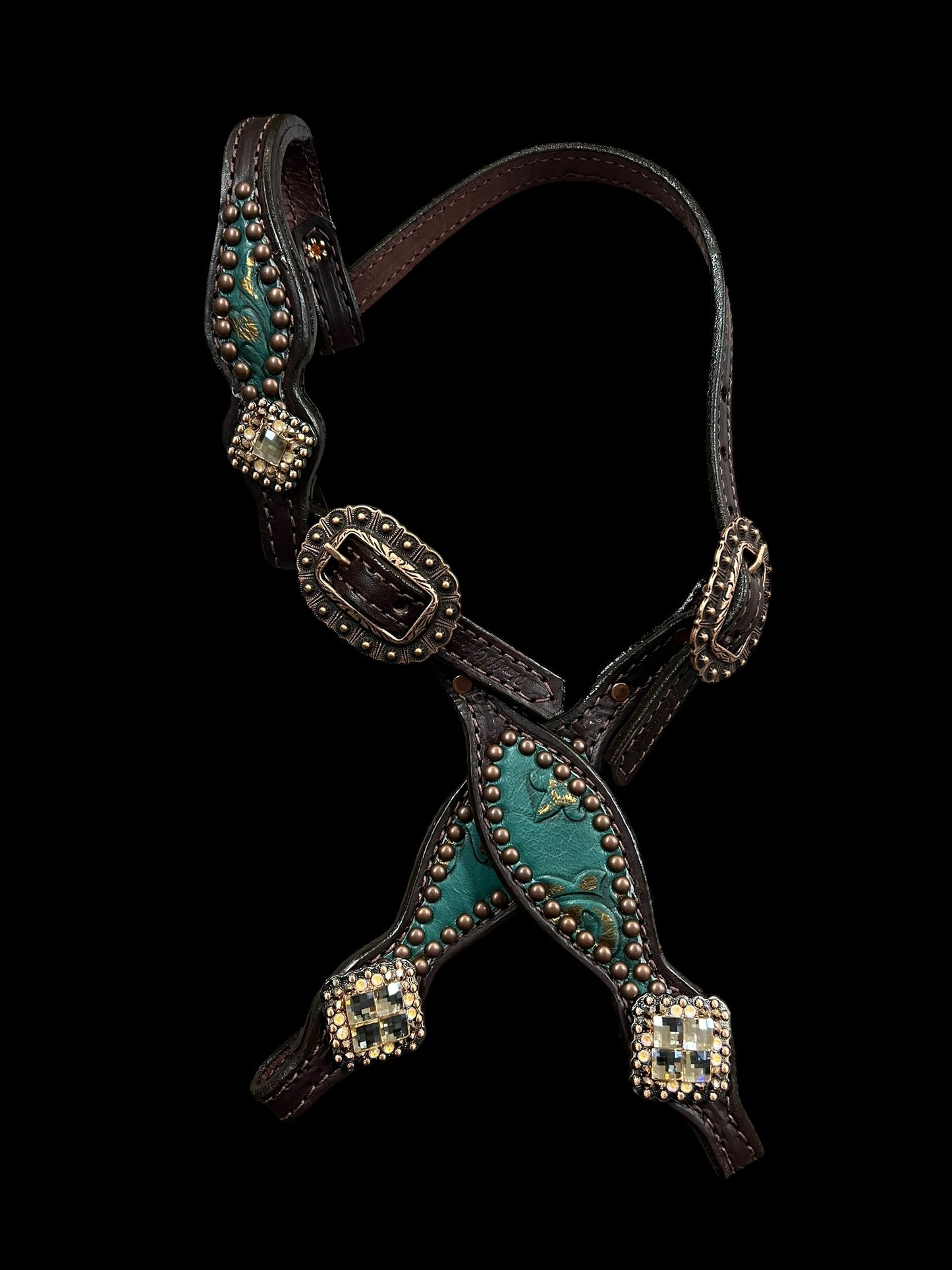 jade and copper on dark leather