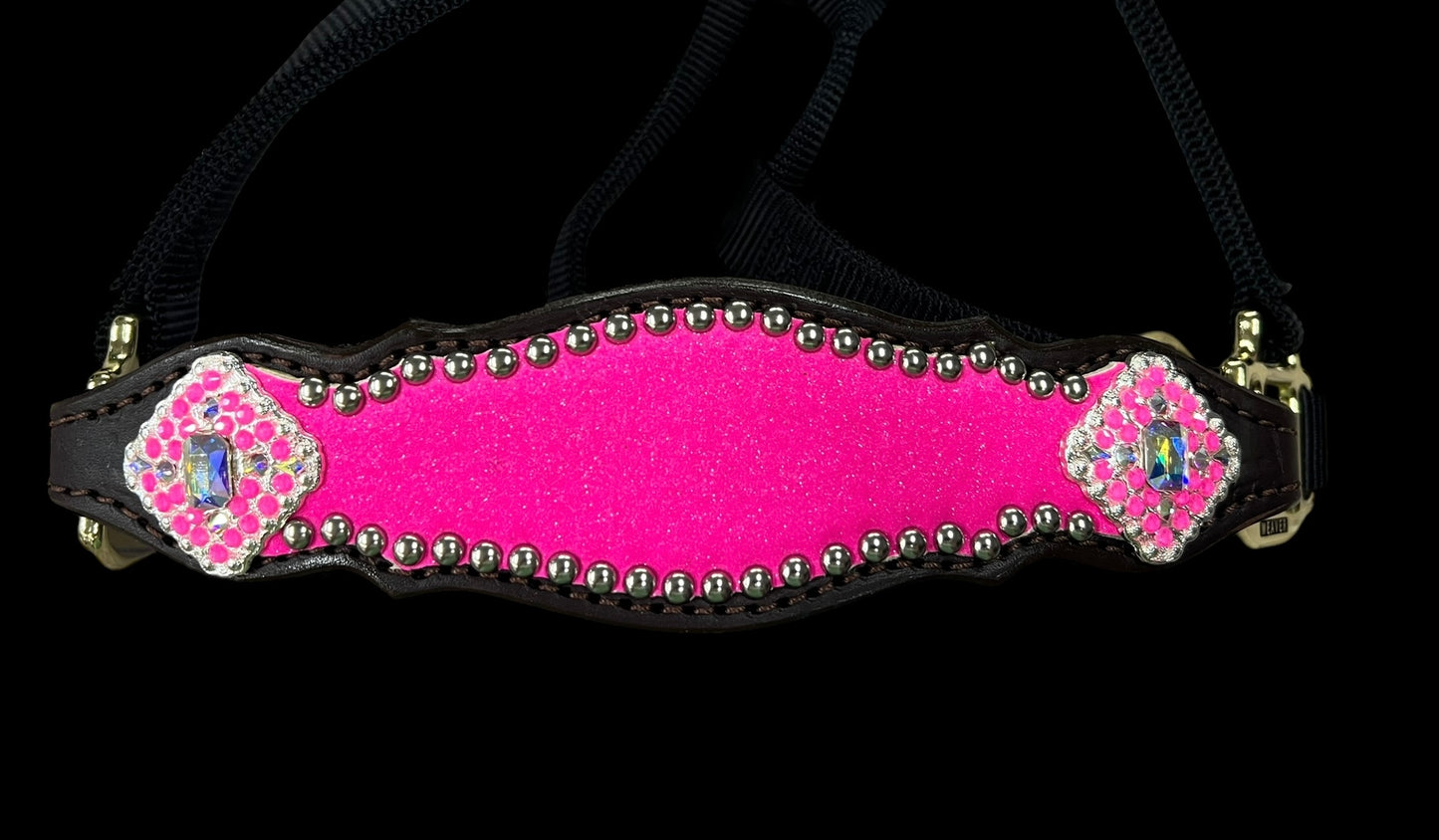 Hot pink glitter on dark leather