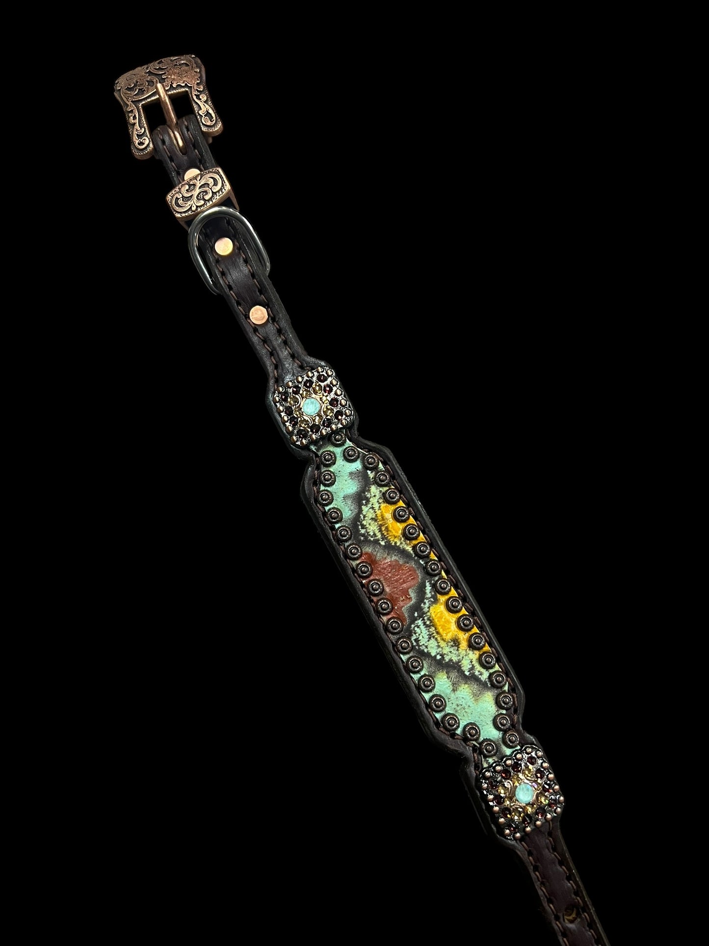 Yellow, mint, and brick red Taos on dark leather