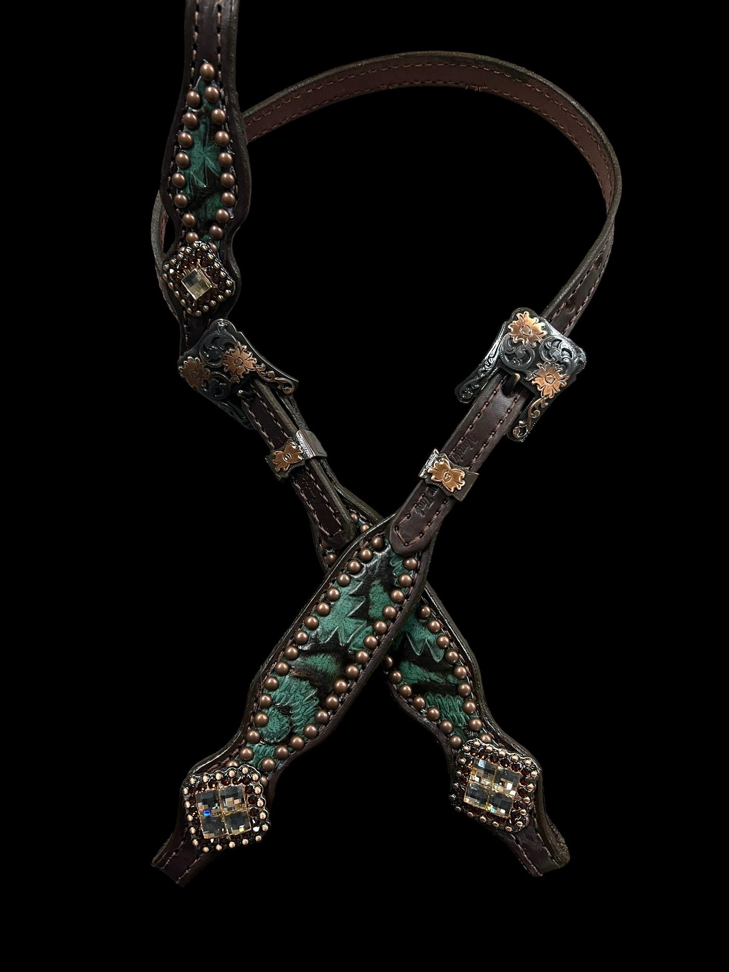 Teal and brown aztec on dark leather