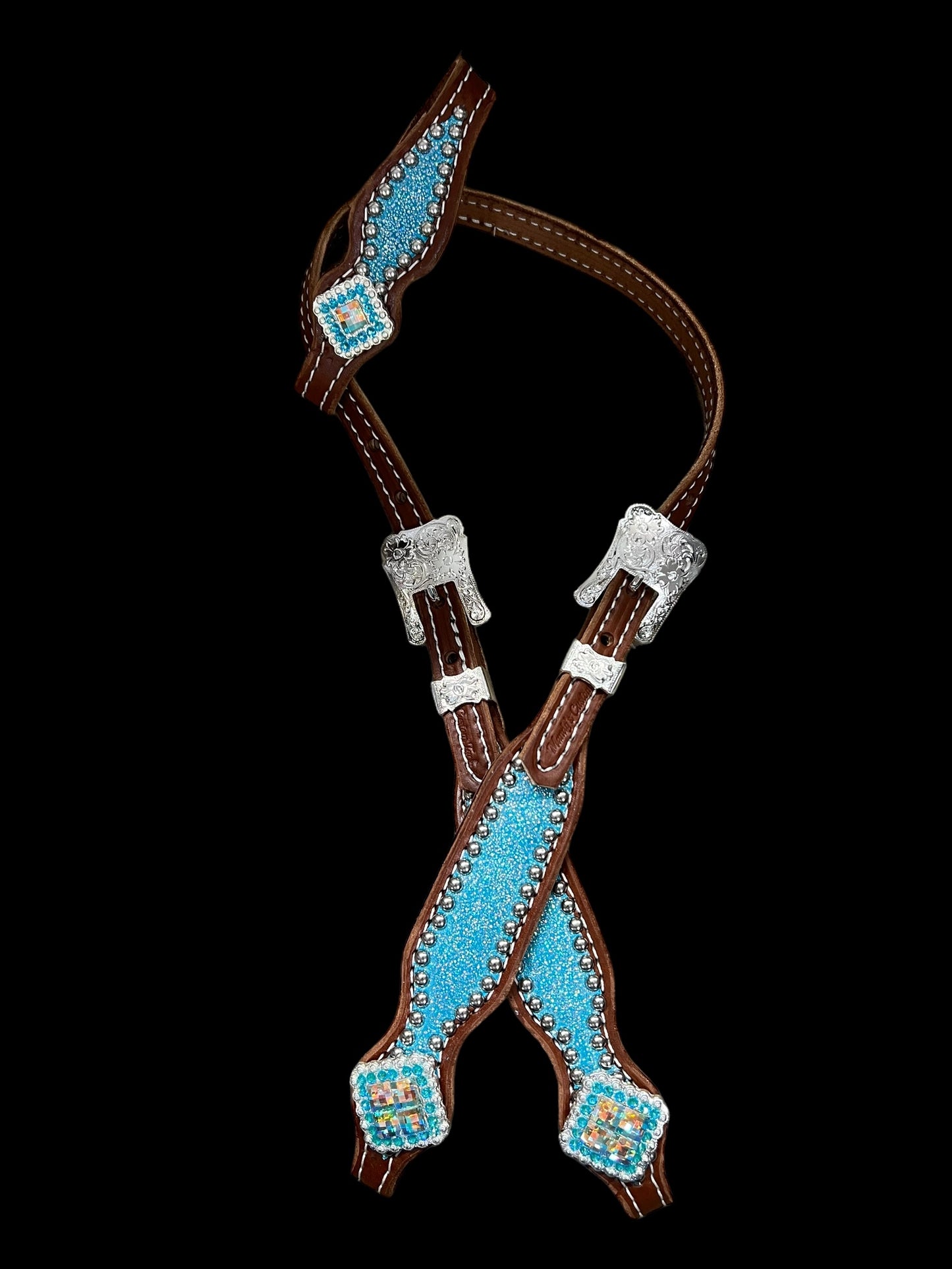 Turquoise sparkle on medium leather