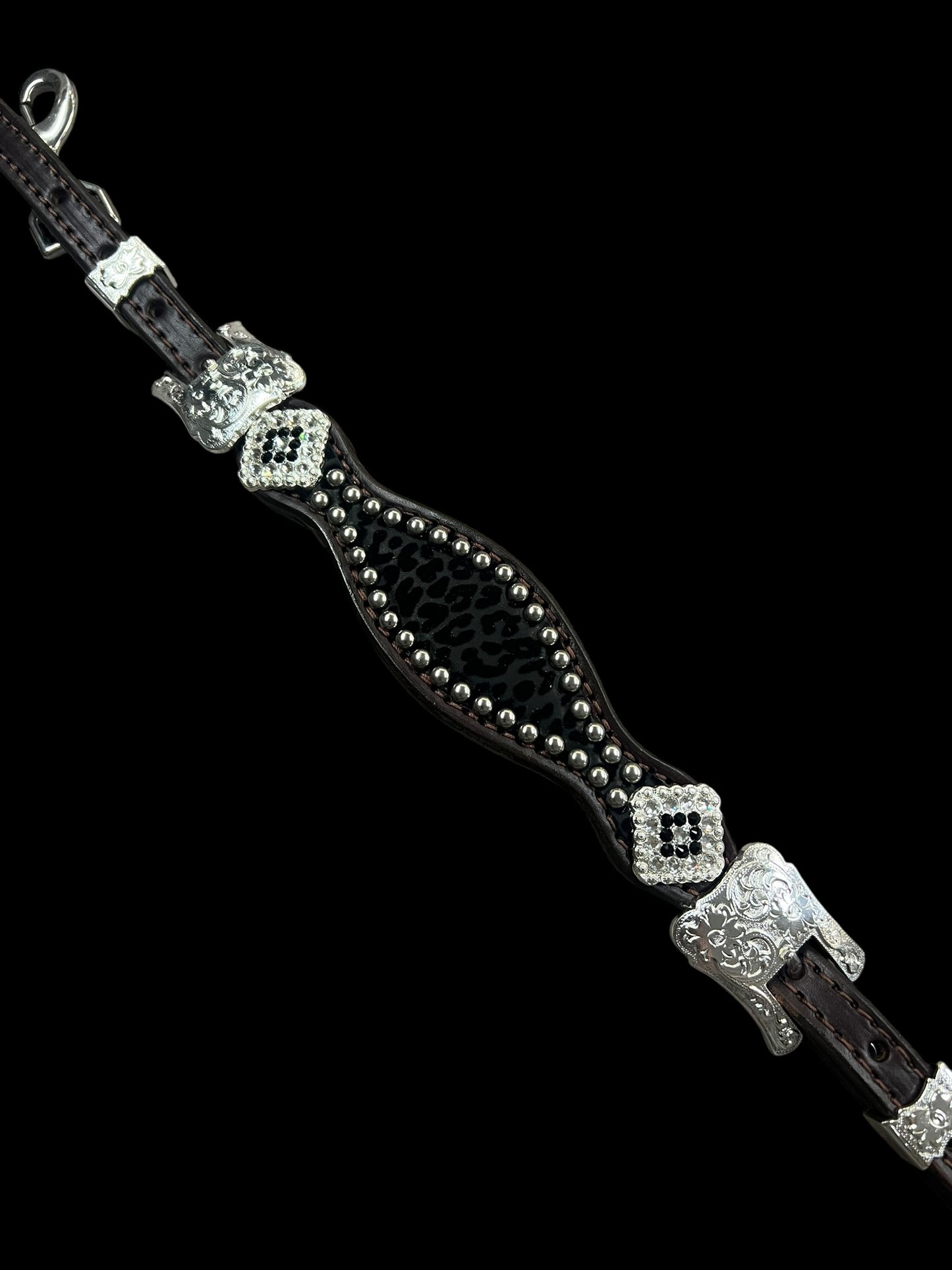 Black flocked leopard on dark leather