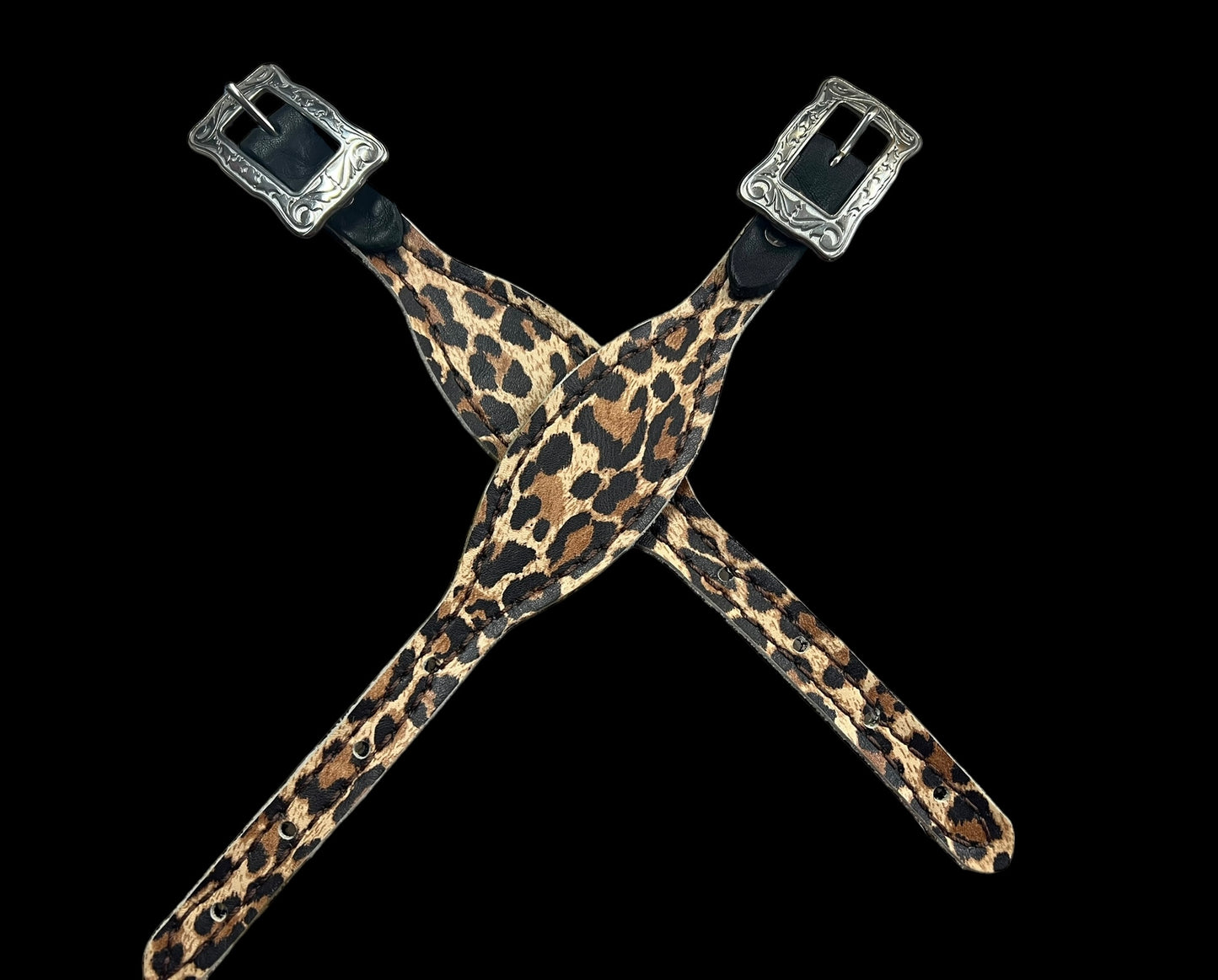 Leopard on dark leather