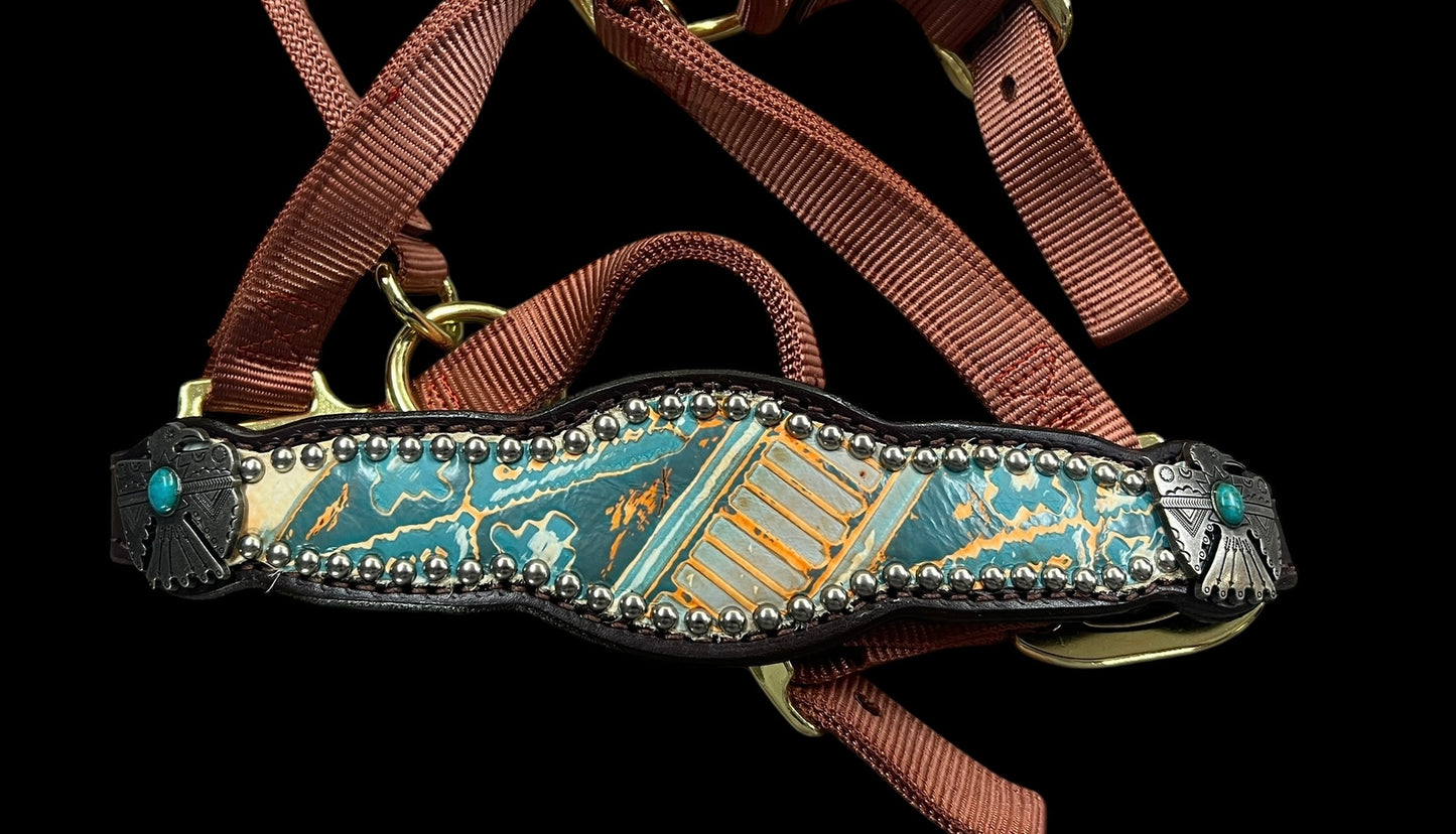 Orange and turquoise navajo on dark leather