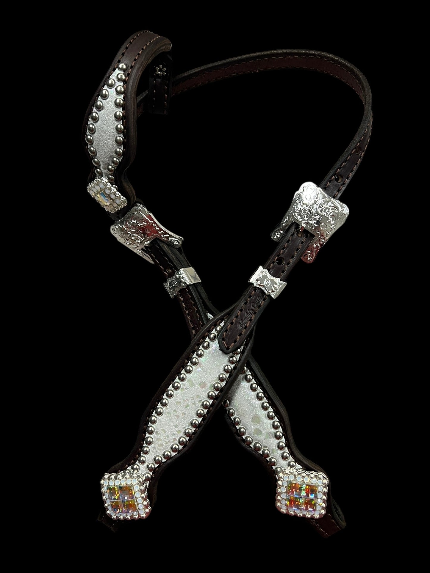 White mystic  on dark leather