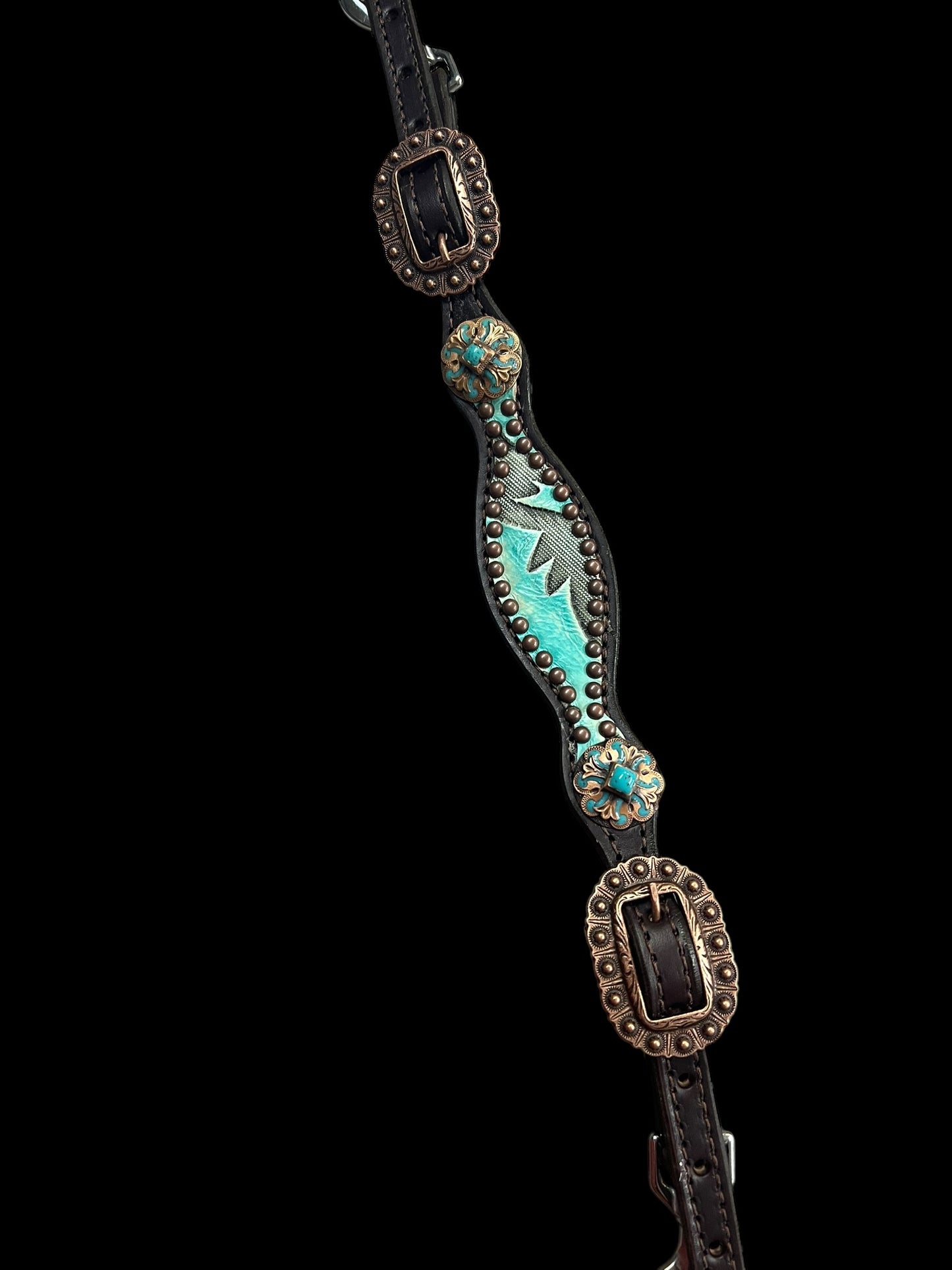 Light turquoise Laredo on dark leather