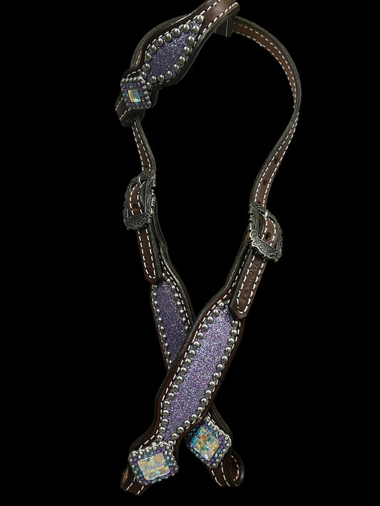 Lilac glitter on walnut leather