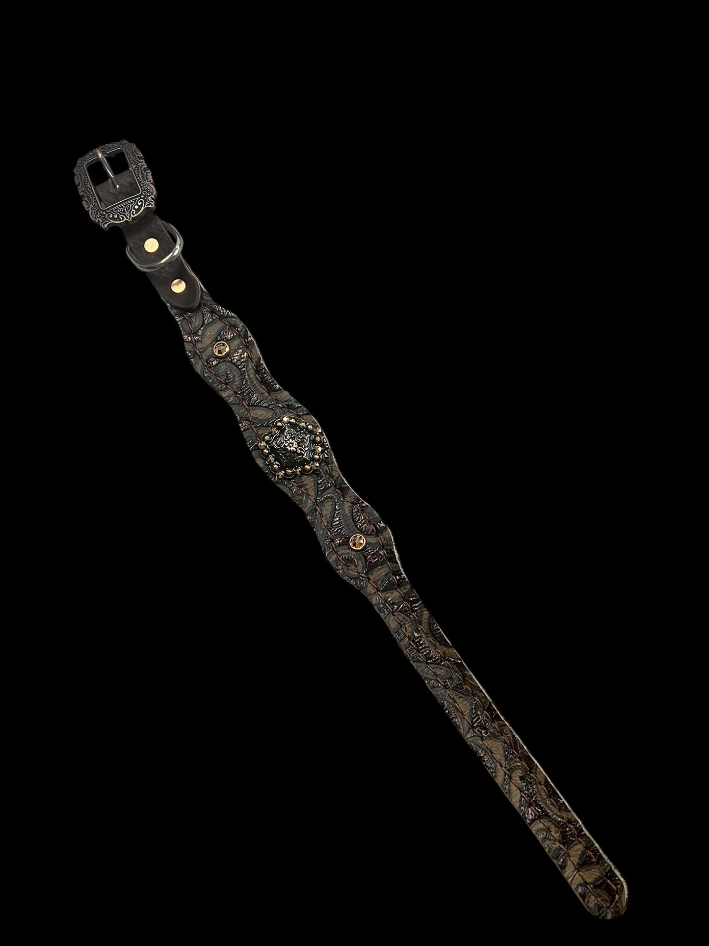 Brown swirl on dark leather