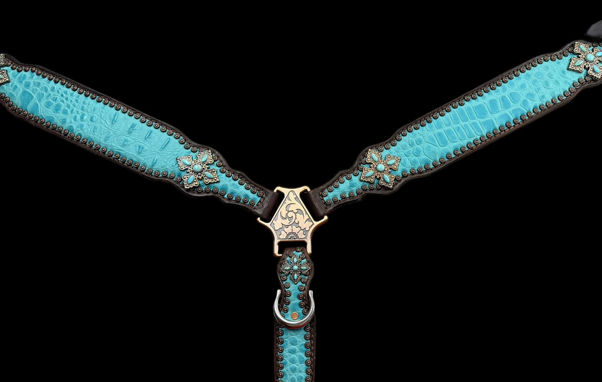 Turquoise gator on dark leather