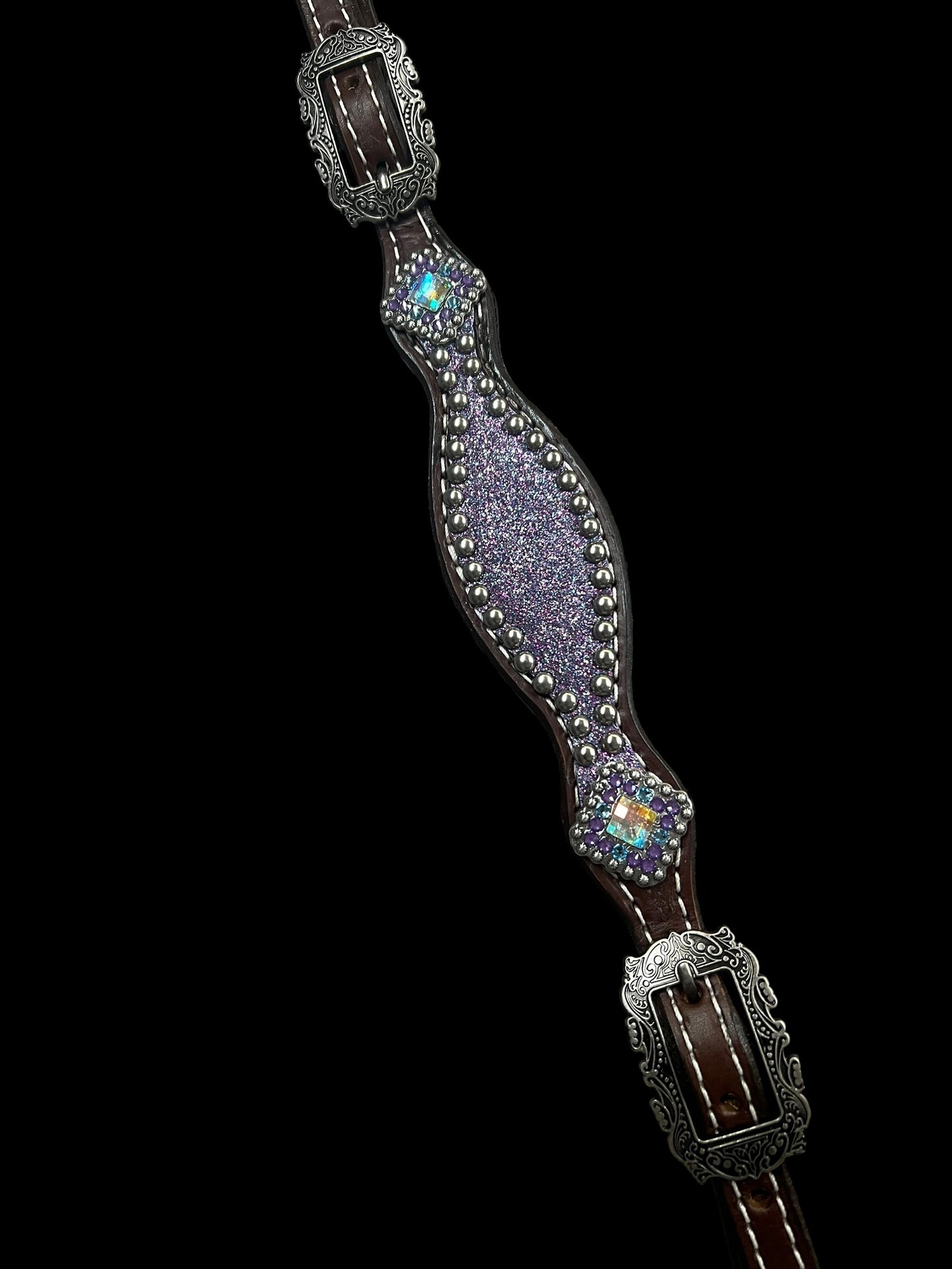 Lilac glitter on walnut leather