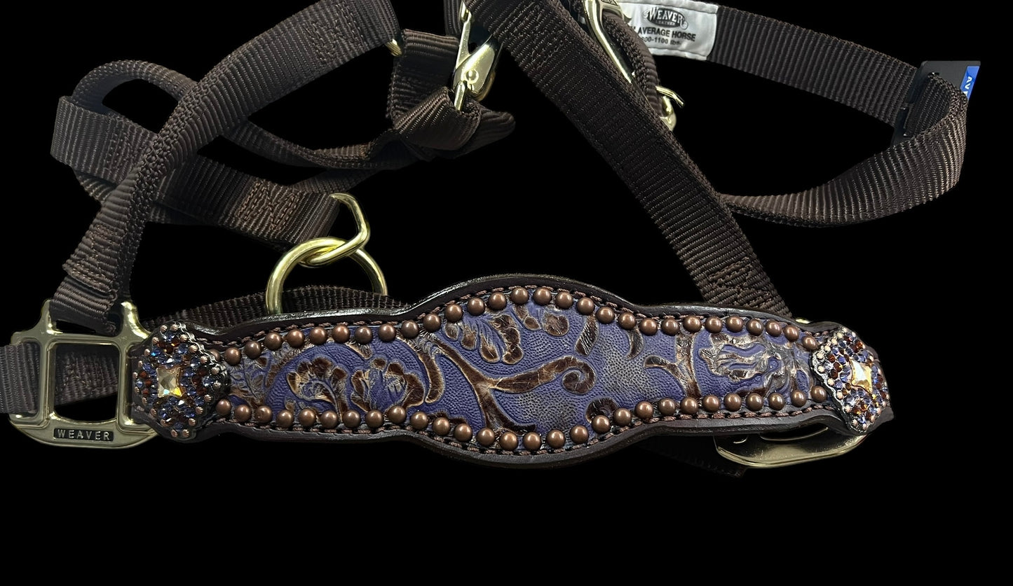 Purple and brown cowboy tool on chocolate leather