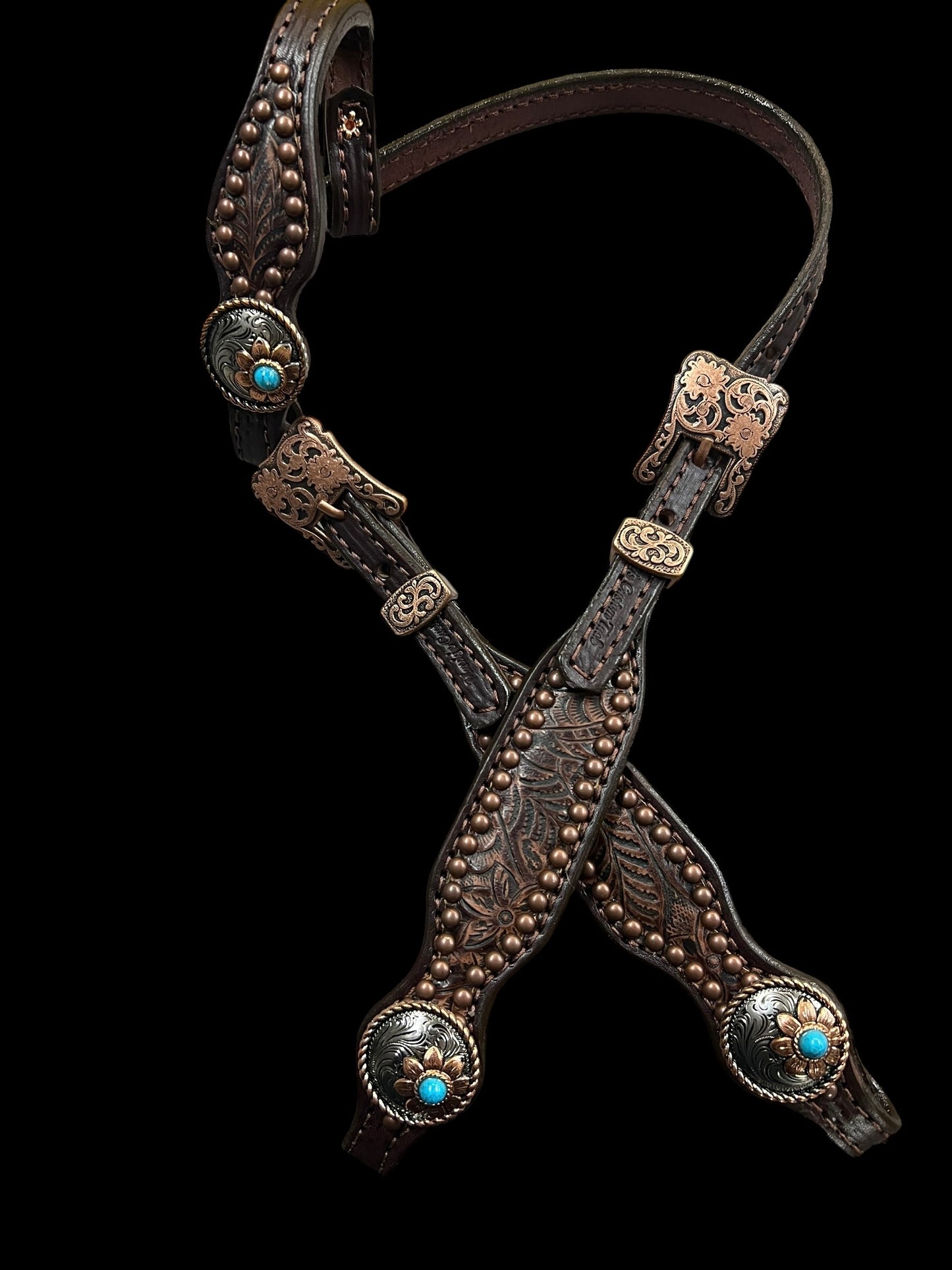 Brown floral on dark leather