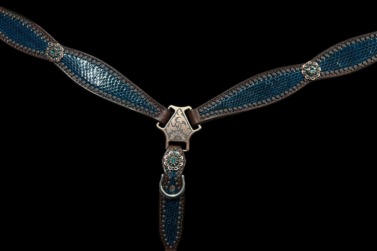 Teal snake on walnut leather