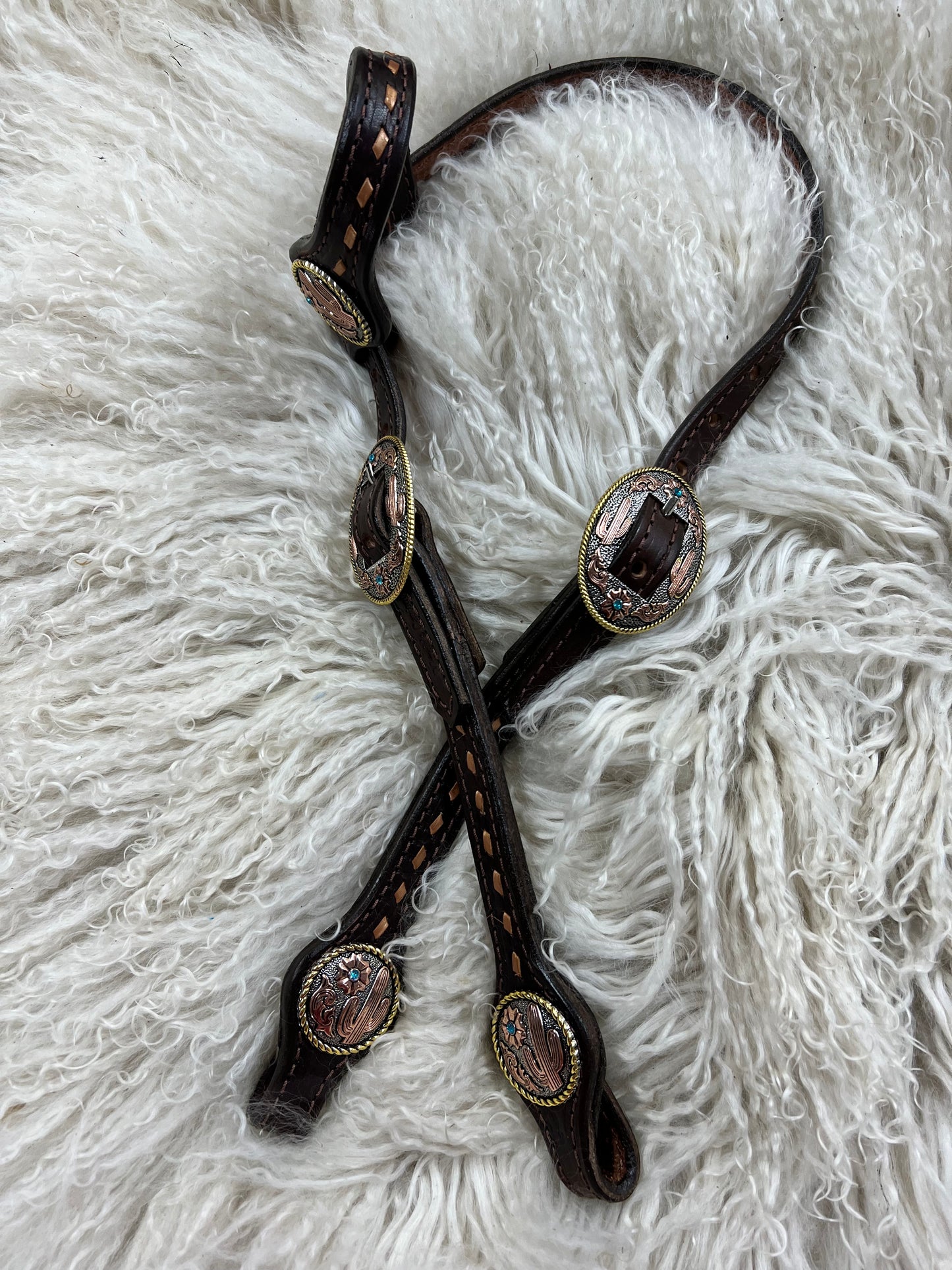 Buckstitched one ear headstall with premium conchos