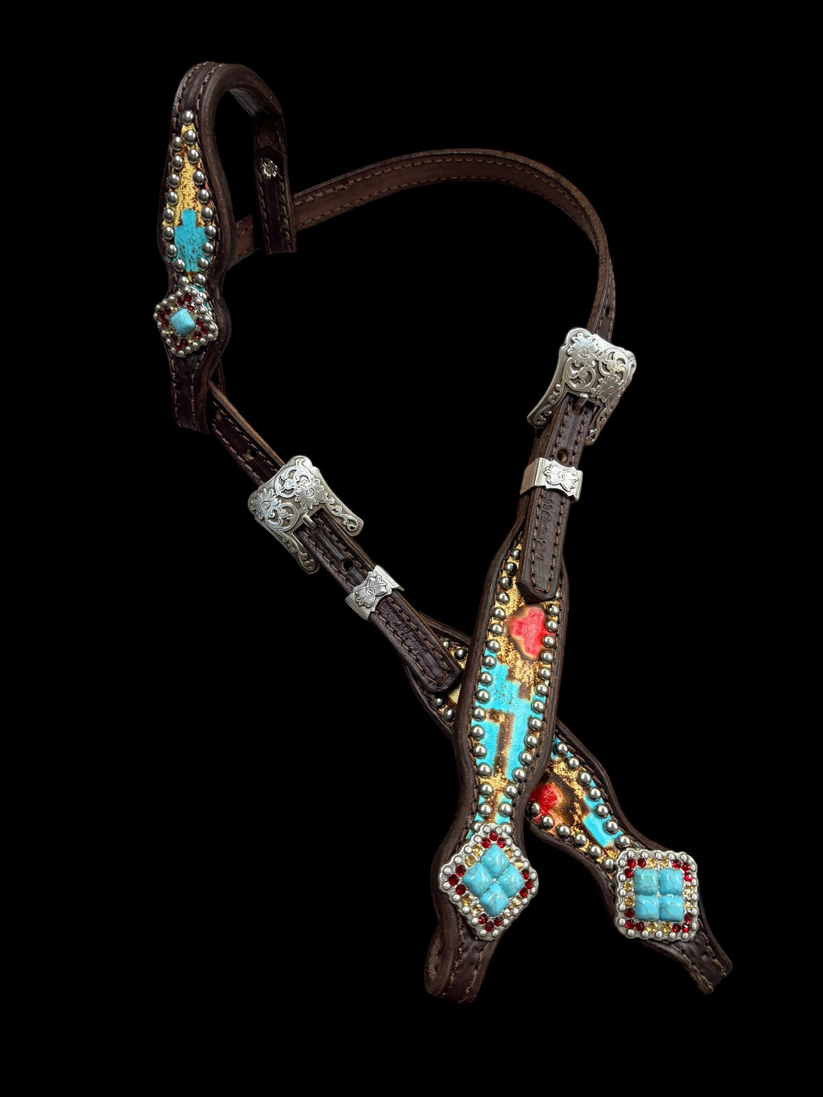 Tan, Red, and Turquoise Taos on dark leather