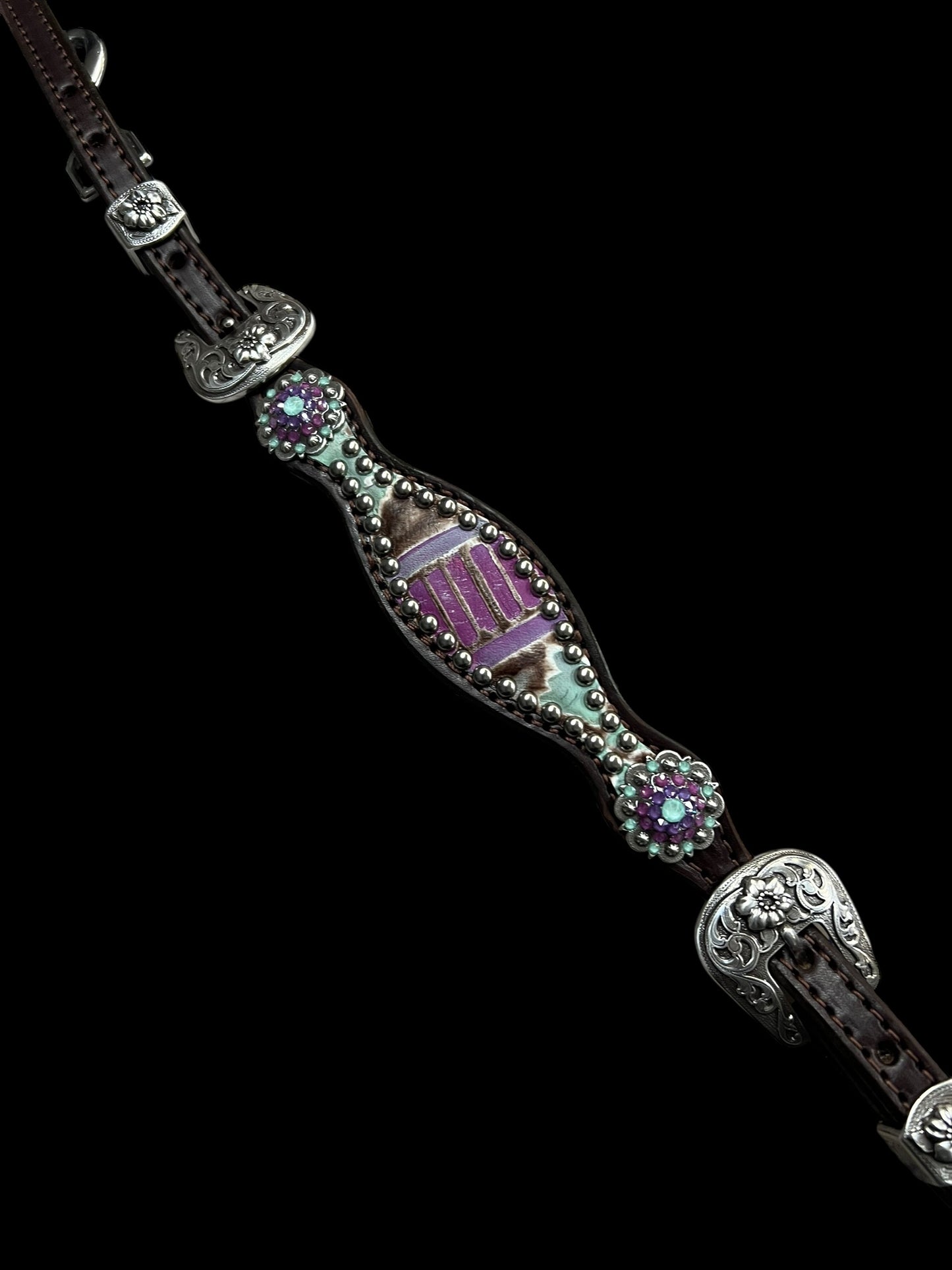 Mint and purple Navajo on dark leather