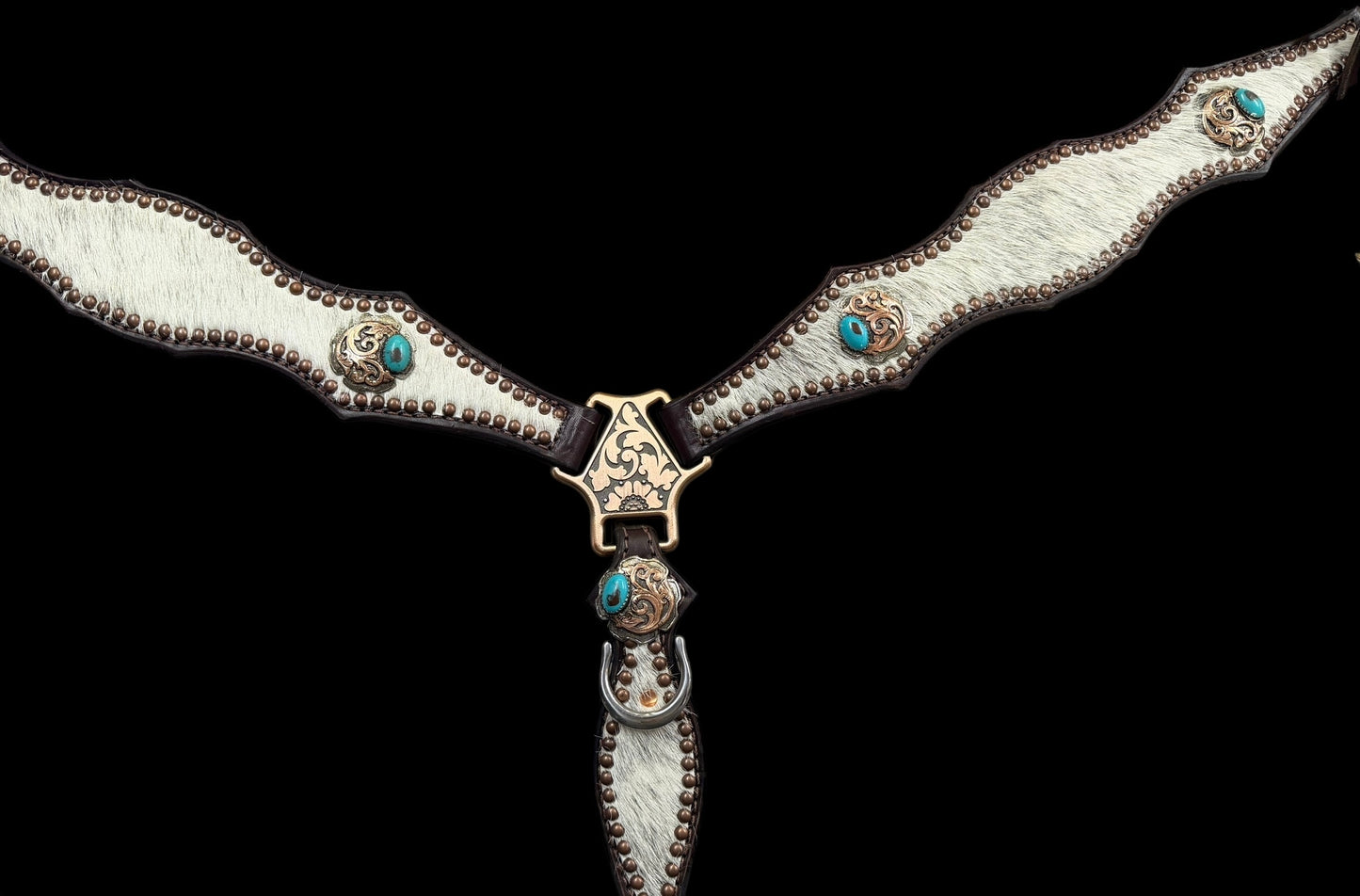 White and grey brindle  cowhide on dark leather