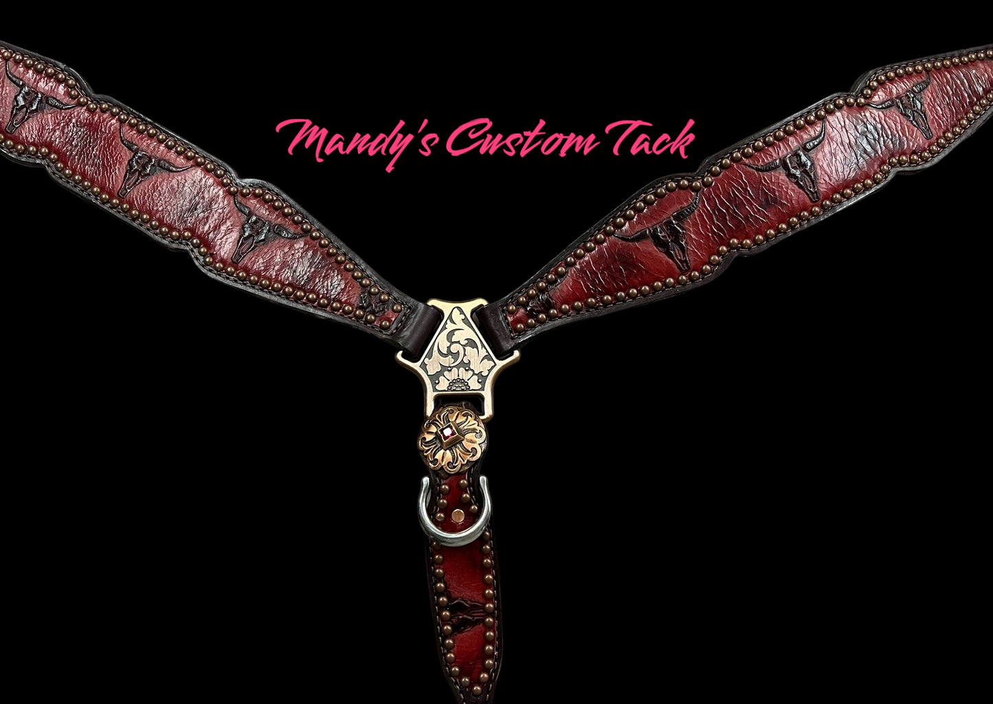 Red longhorns on dark leather