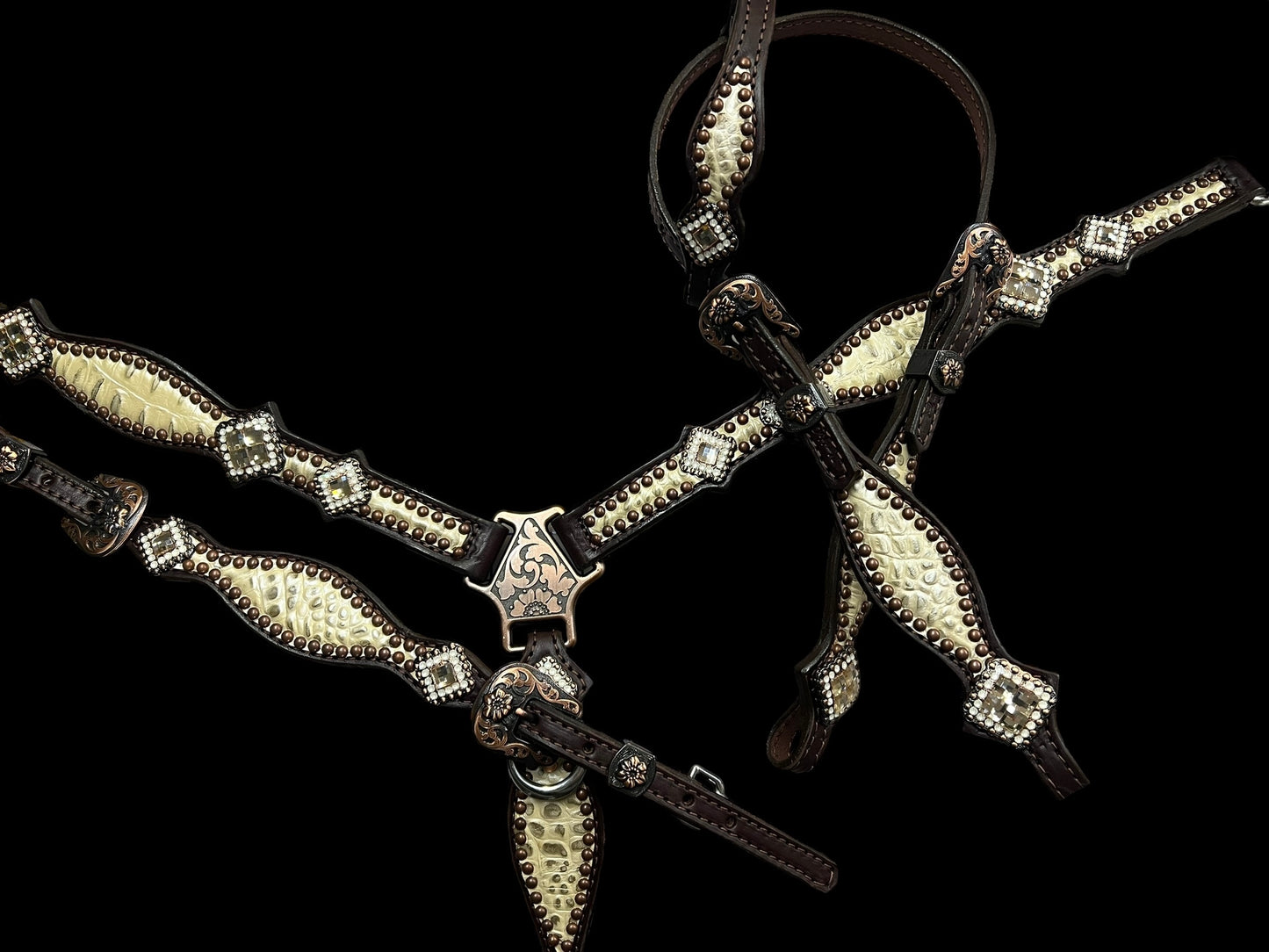 Champagne gator on dark leather