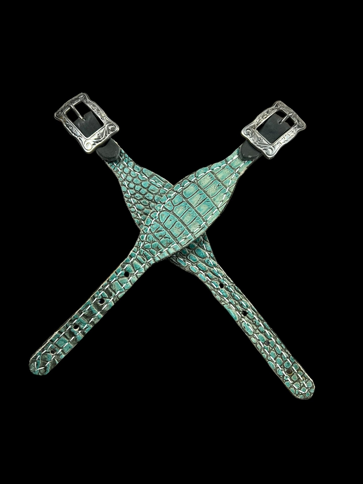 Antique turquoise gator on dark leather