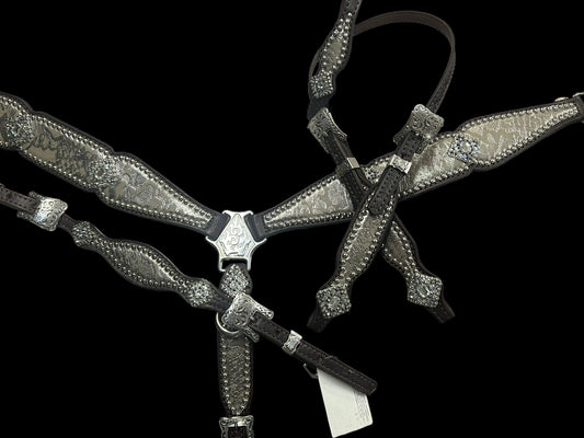 Silver snake on dark leather