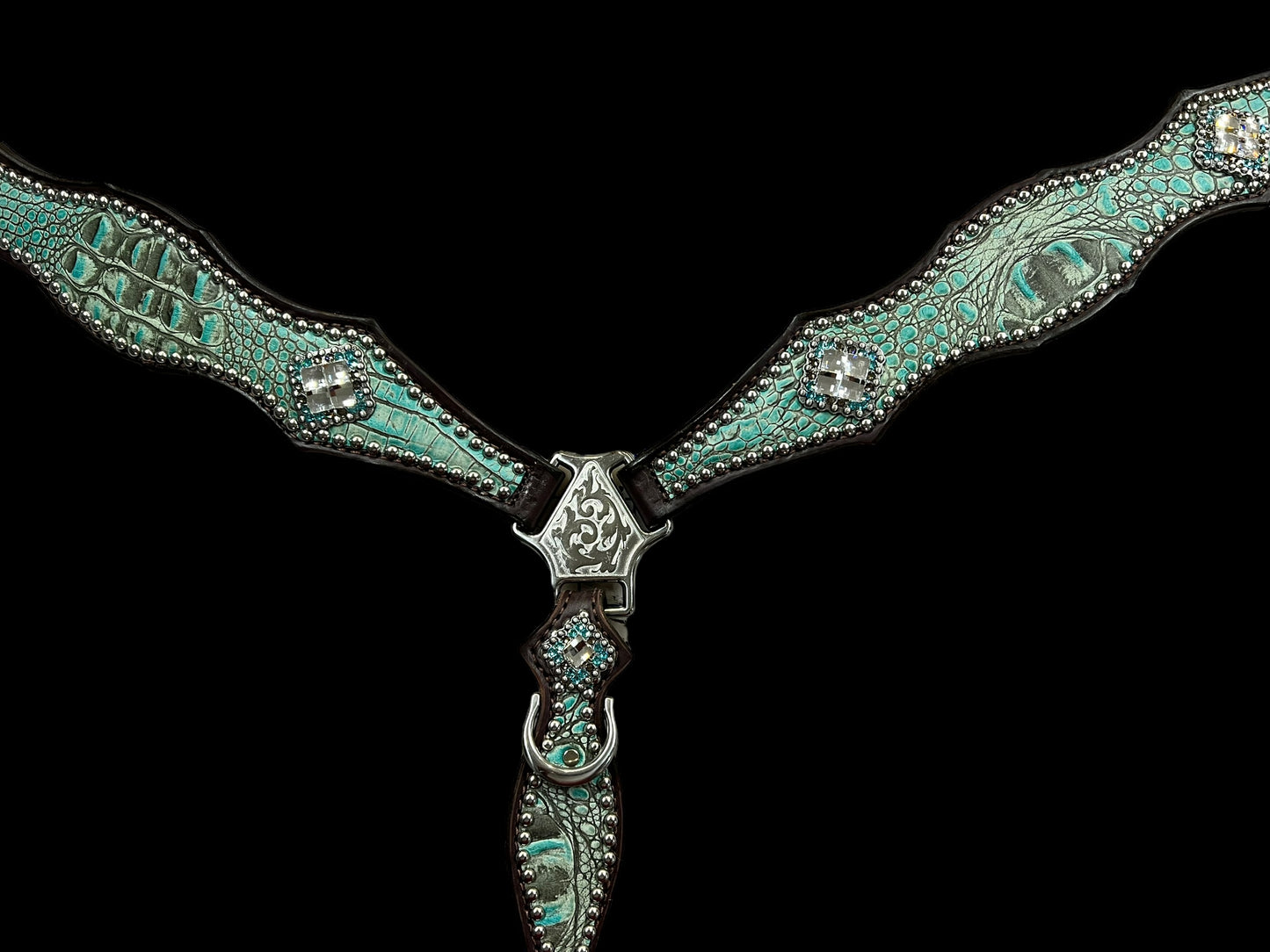 Antique turquoise gator on dark leather