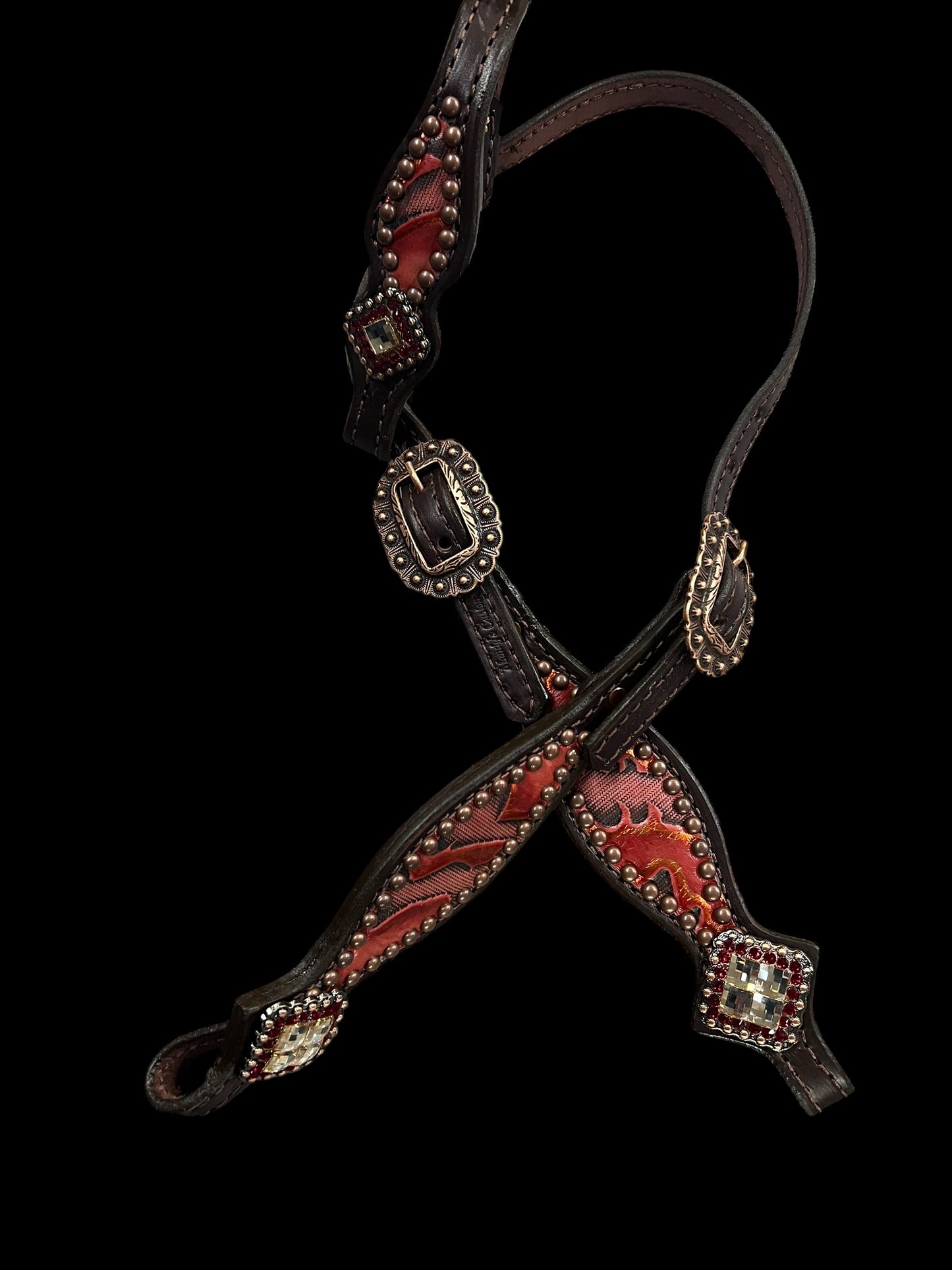 Red and copper Laredo on dark leather