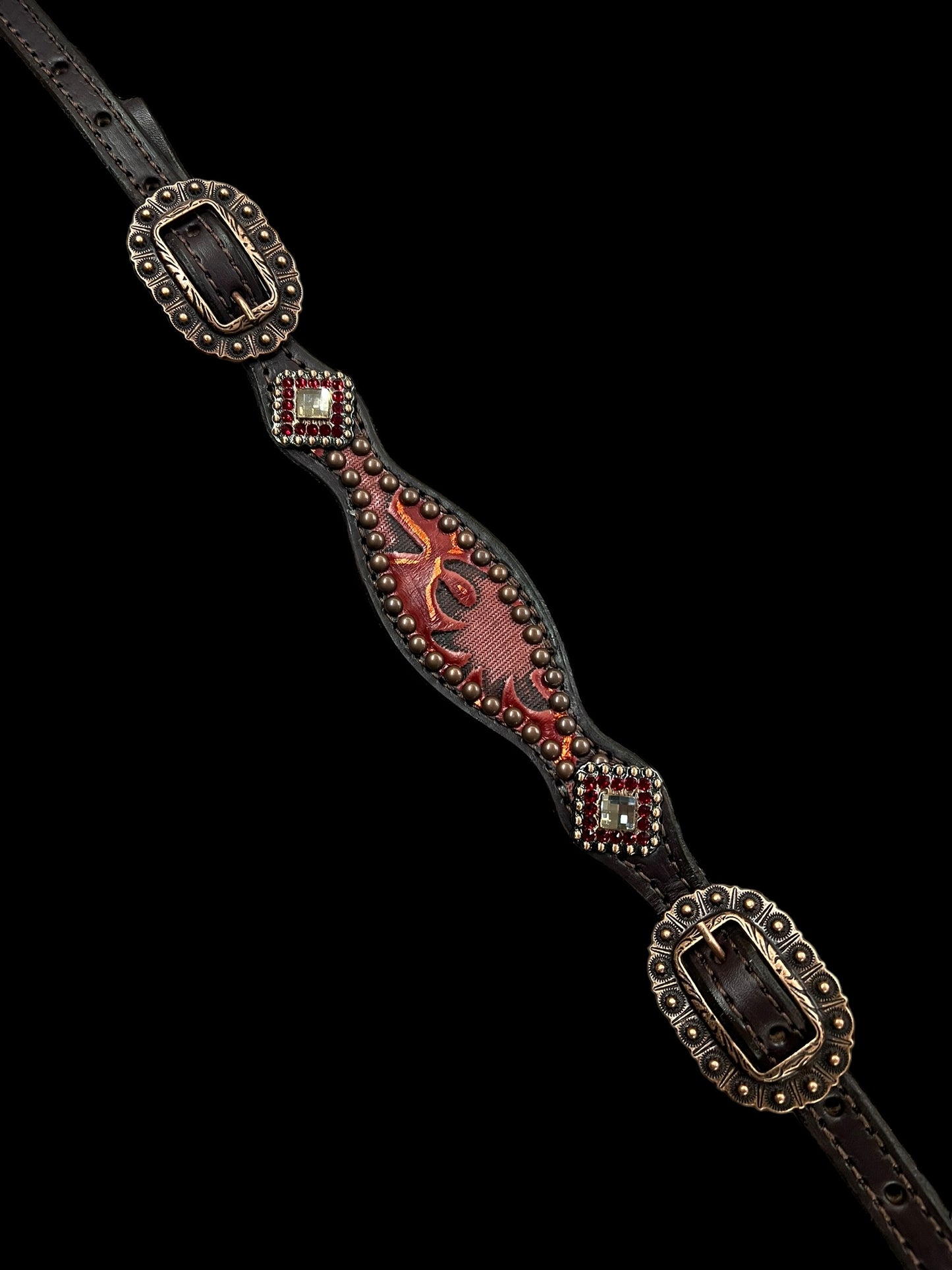 Red and copper Laredo on dark leather