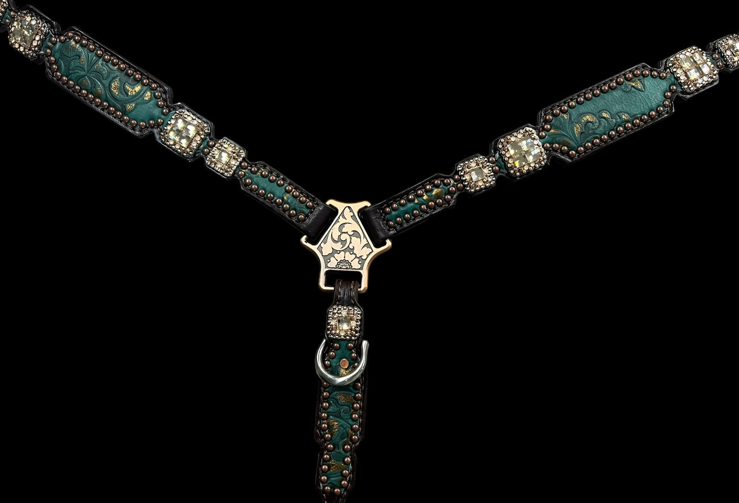 jade and copper on dark leather