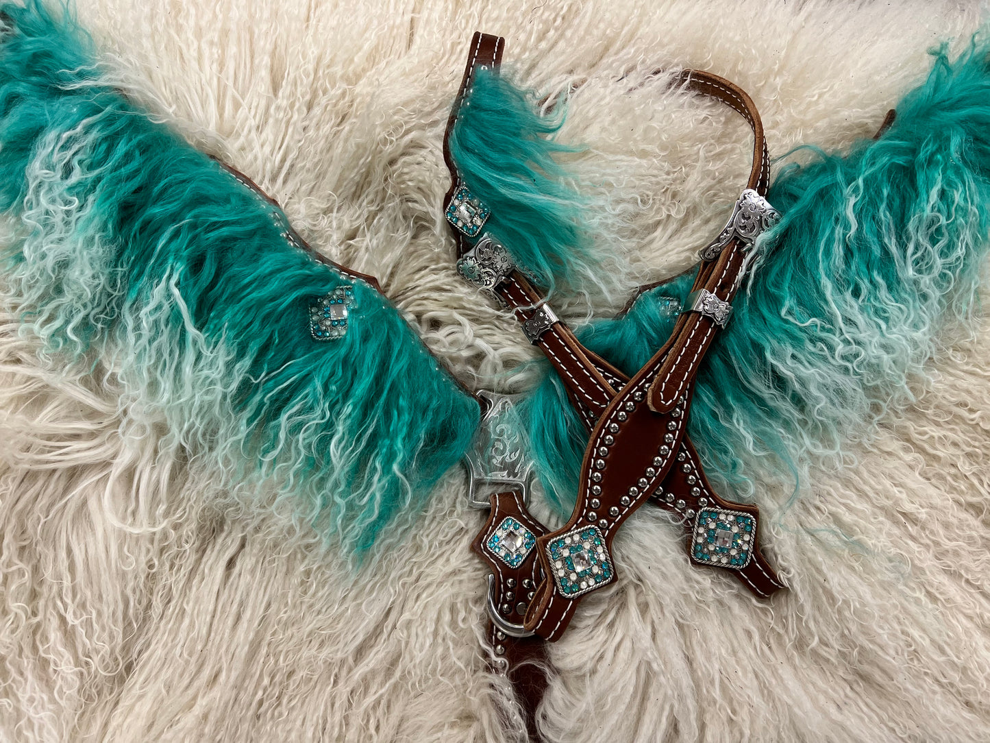 Teal angora on medium leather