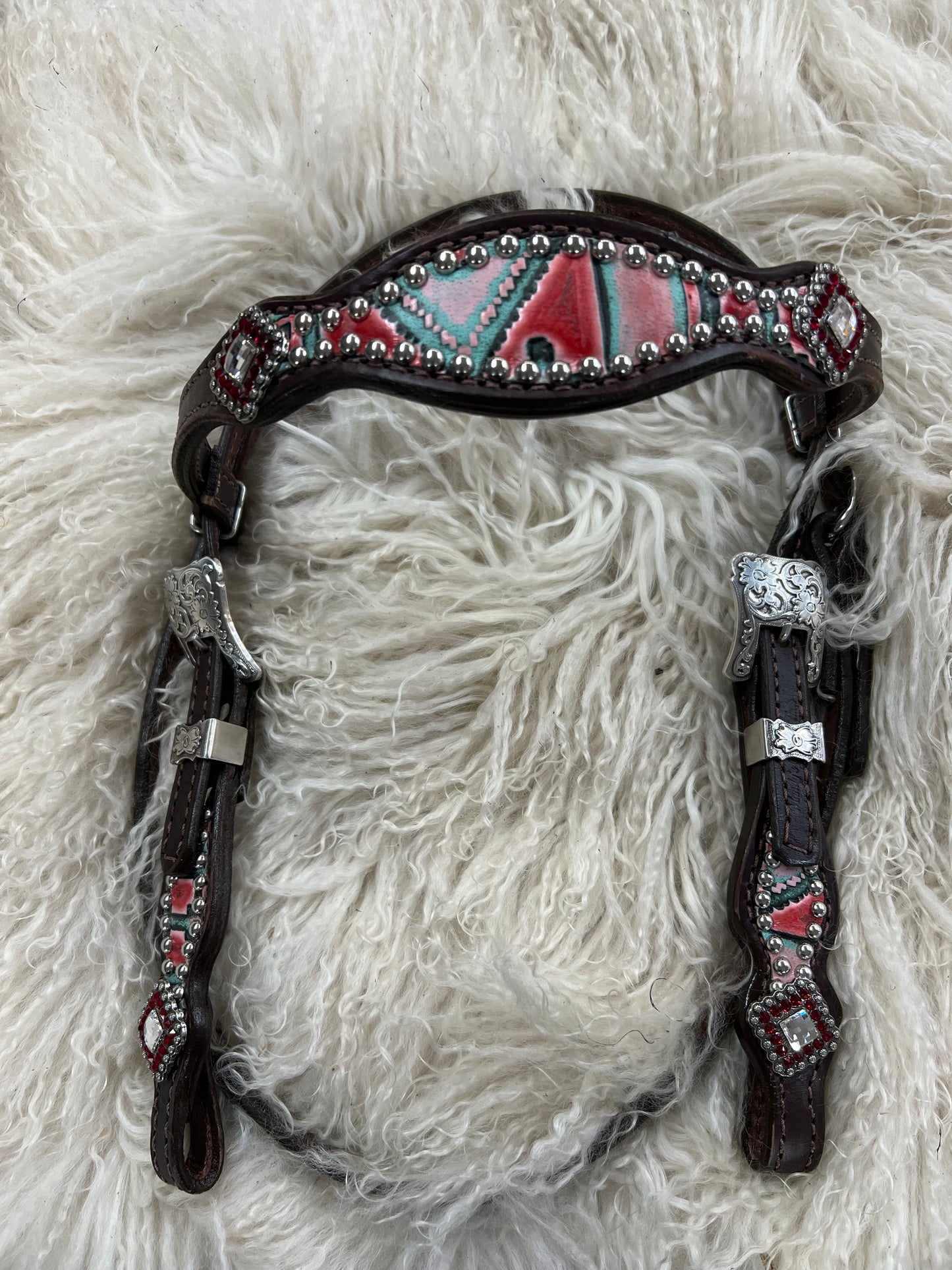 Red and mint navajo on dark leather