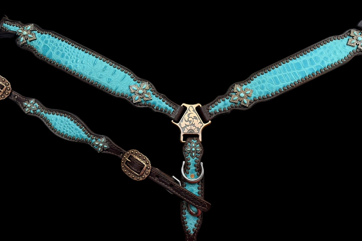 Turquoise gator on dark leather