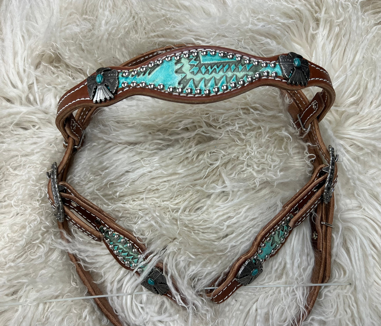 Turquoise aztec on medium  leather