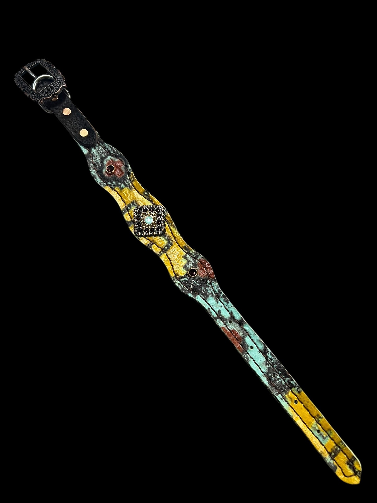 Yellow, mint, and brick red Taos on dark leather