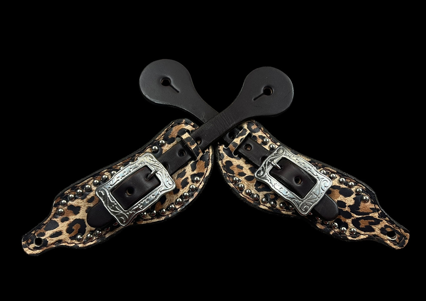 Leopard on dark leather