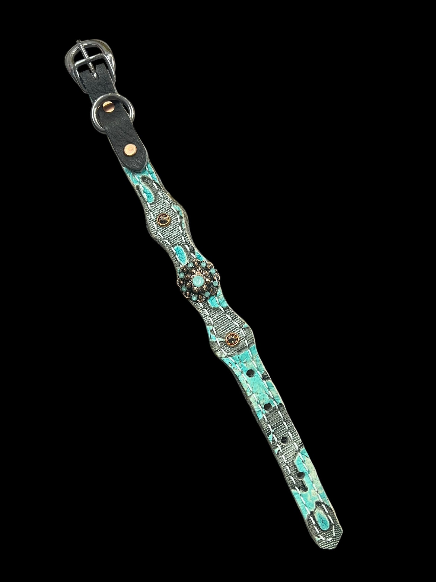 Light turquoise Laredo on dark leather