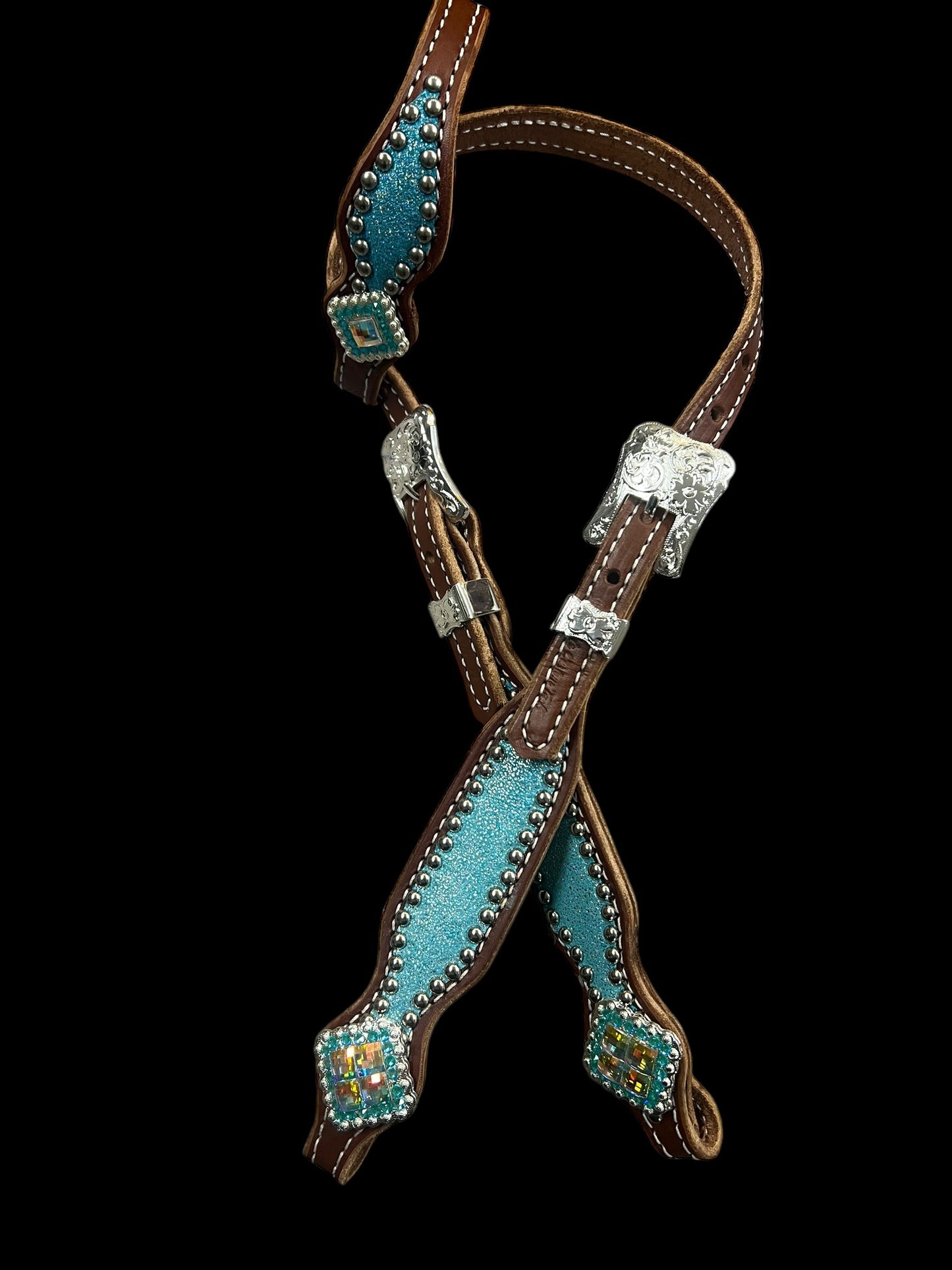 Turquoise sparkle on medium leather