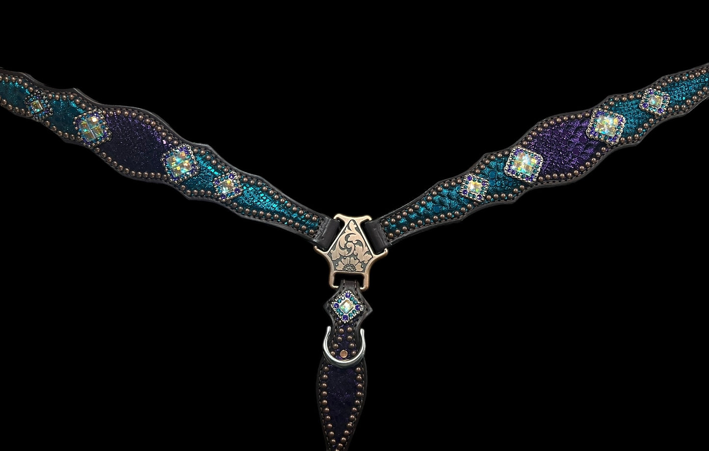 Teal and purple mystic on dark leather