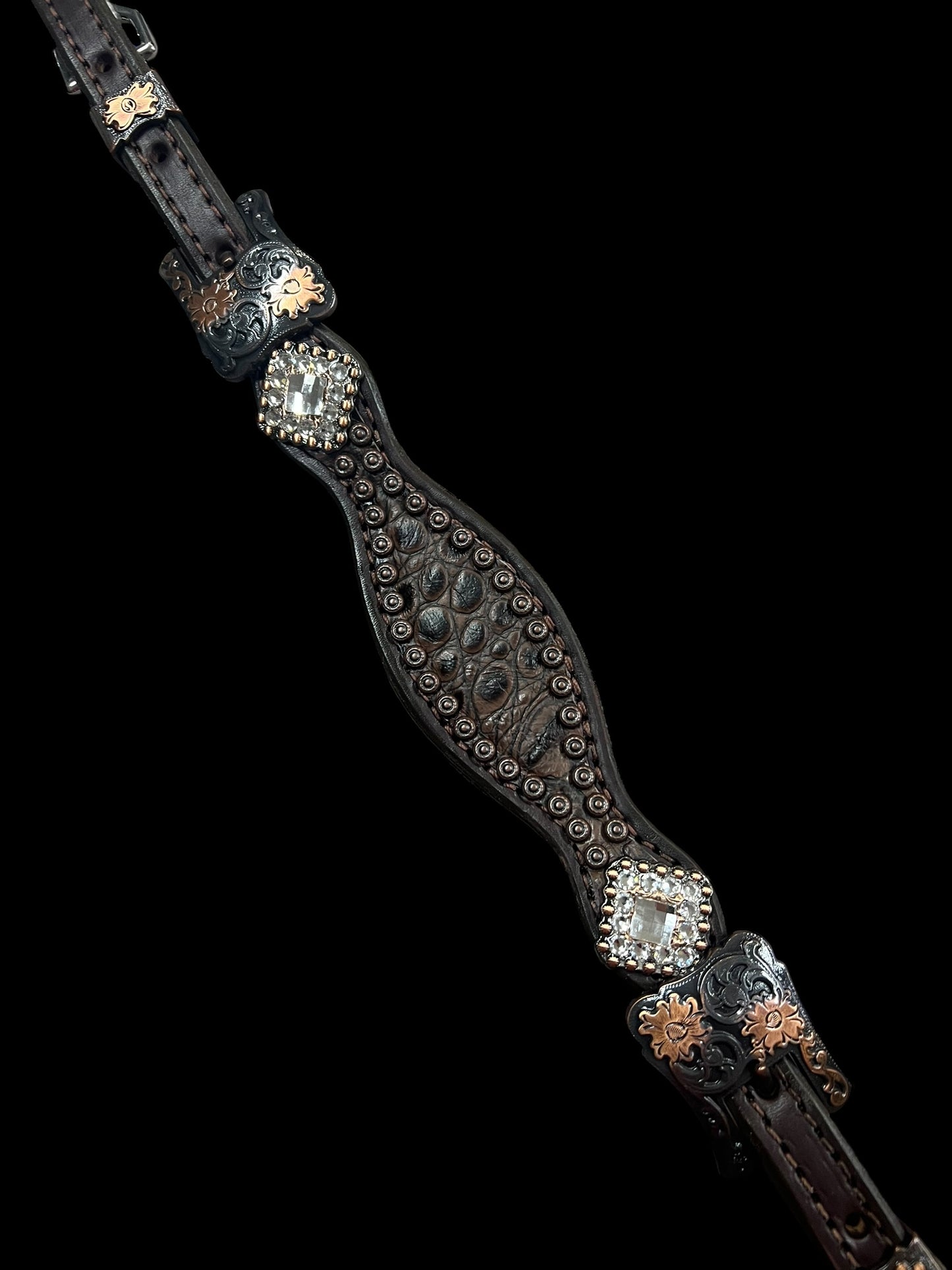 Cocoa gator on dark leather