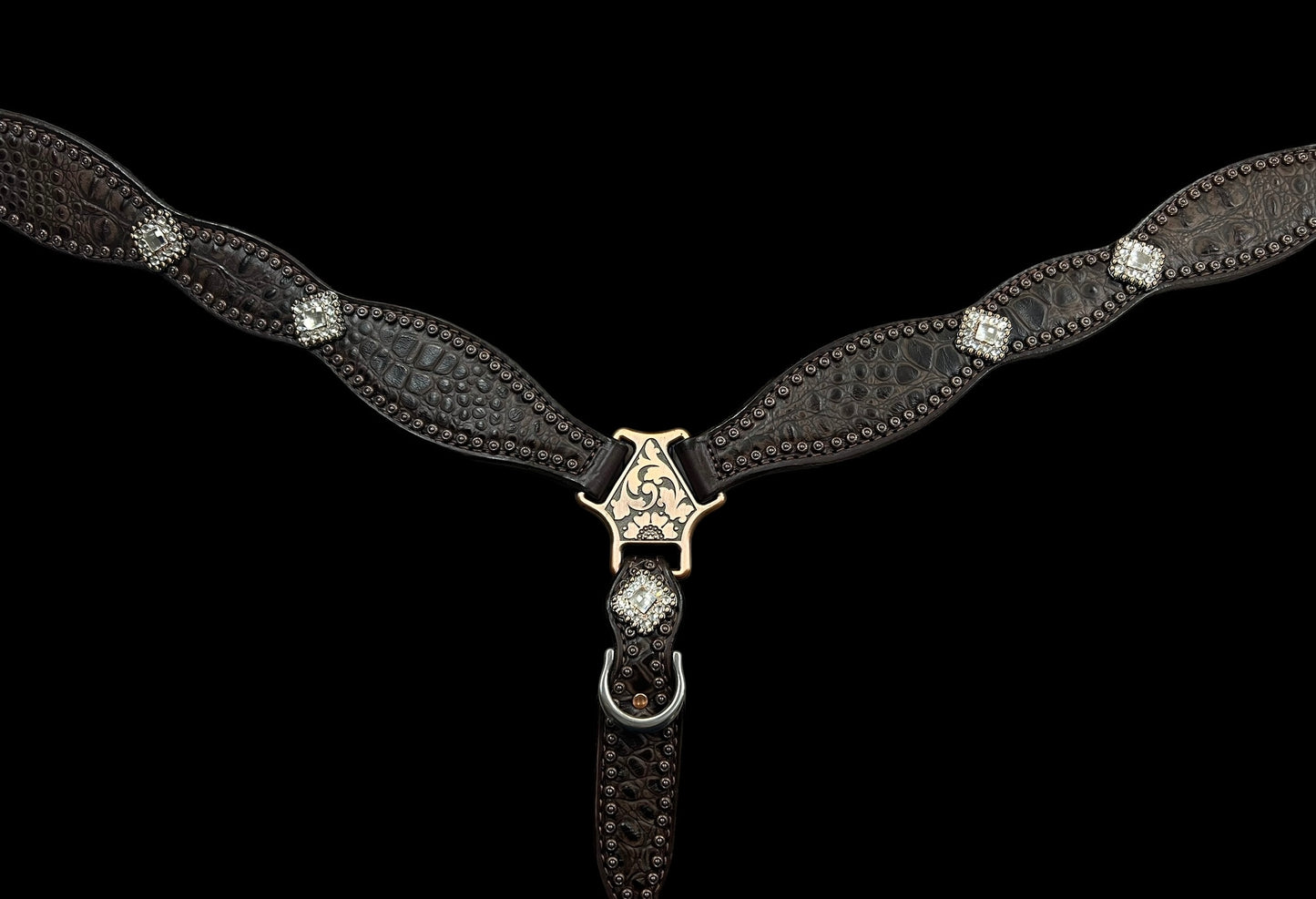 Cocoa gator on dark leather