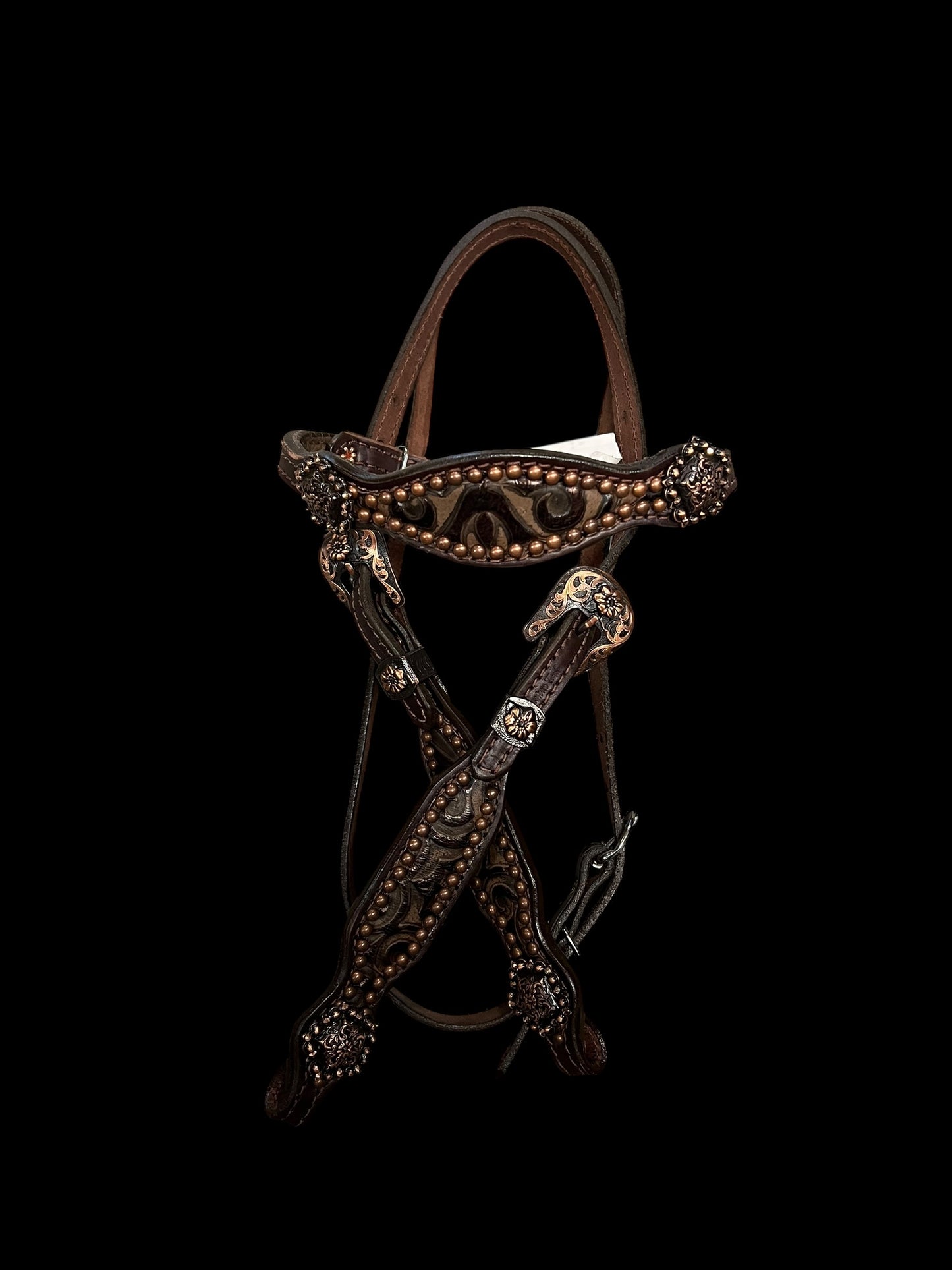 Brown swirl on dark leather