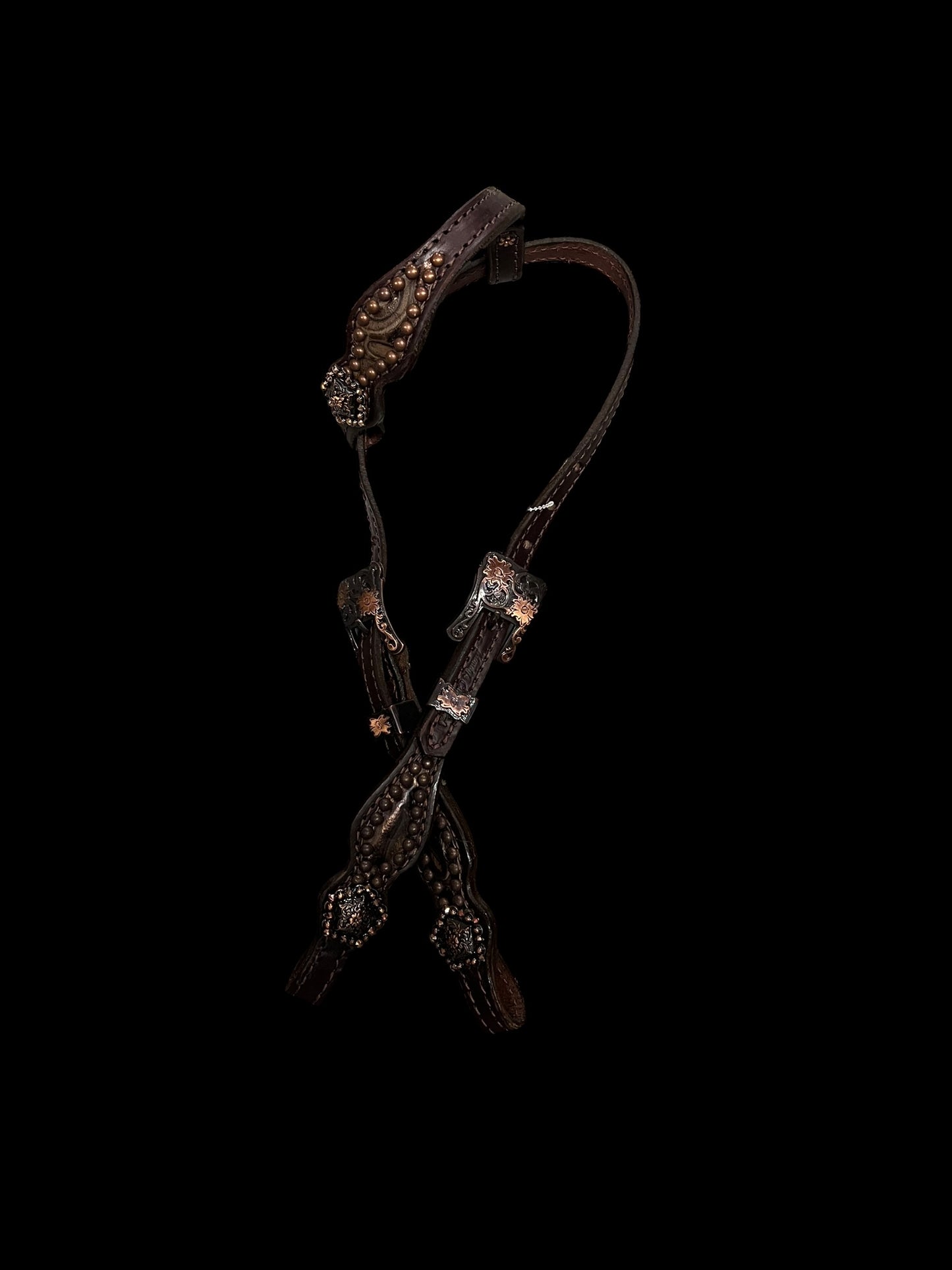 Brown swirl on dark leather