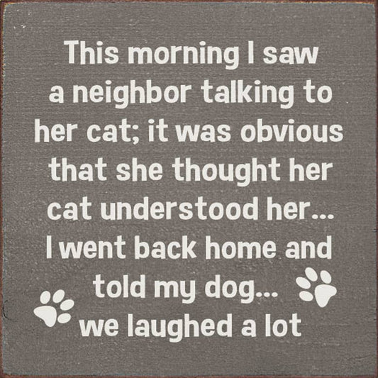 This morning I saw a neighbor talking to her cat .. dog: Old Anchor Gray