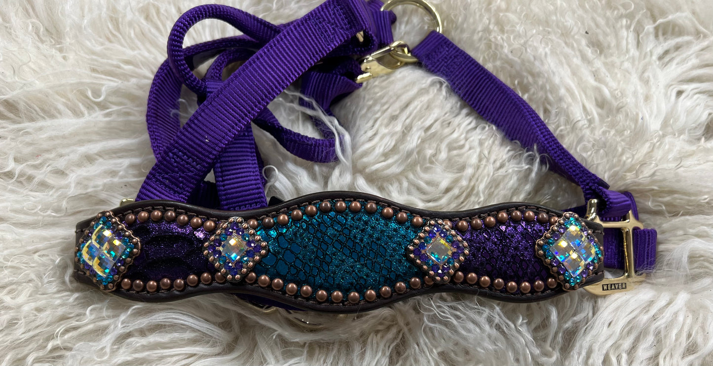 Teal and purple mystic on dark leather